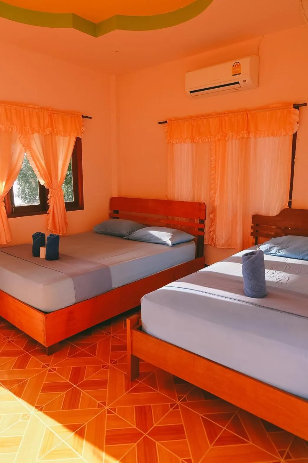 Bed in J.B.Hut Bungalows