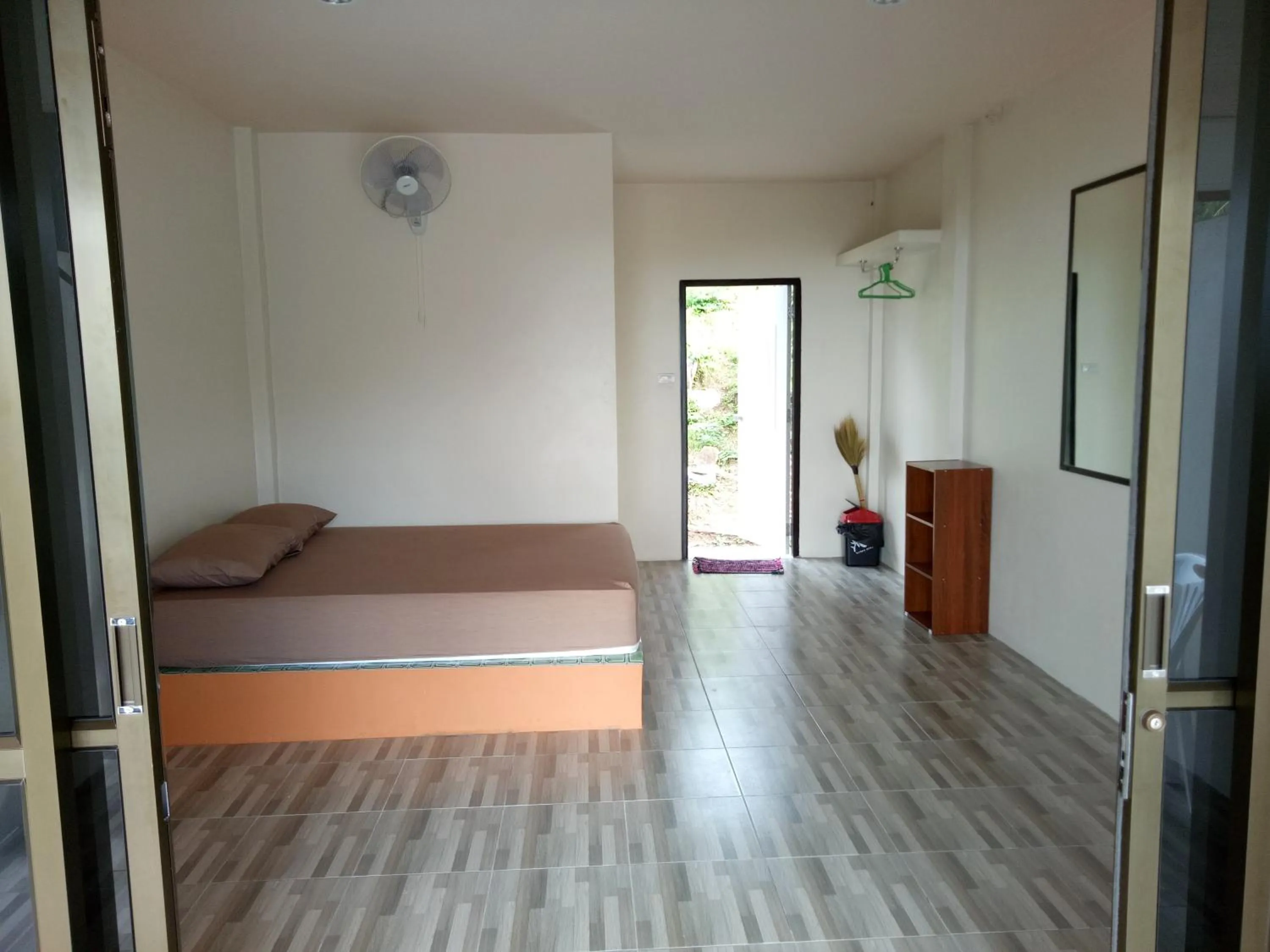 Bed in J.B.Hut Bungalows