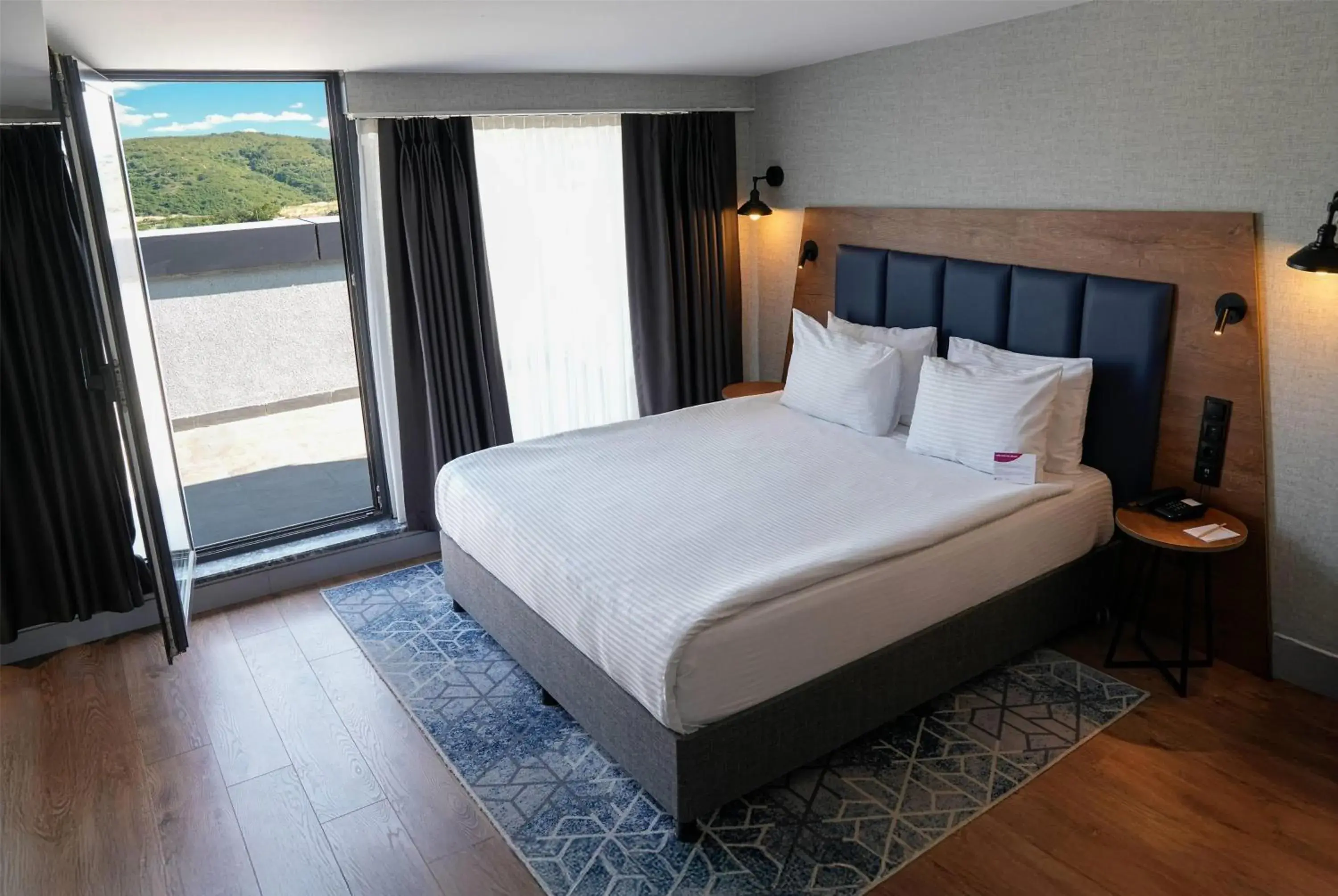 Photo of the whole room, Bed in Ramada Encore by Wyndham Istanbul Arnavutkoy Photo of the whole room, Bed in Ramada Encore by Wyndham Istanbul Arnavutkoy