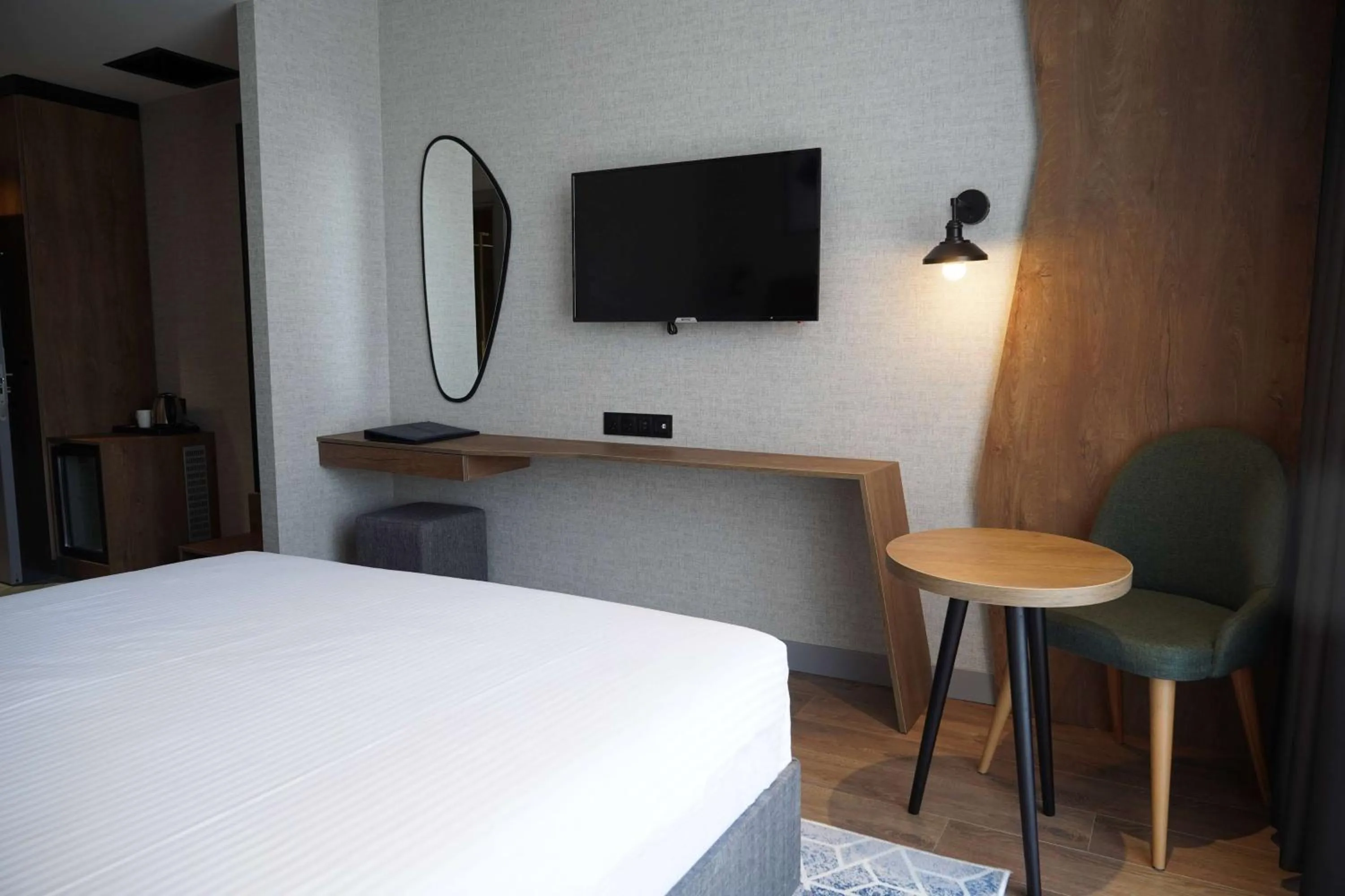 Photo of the whole room, Bed in Ramada Encore by Wyndham Istanbul Arnavutkoy