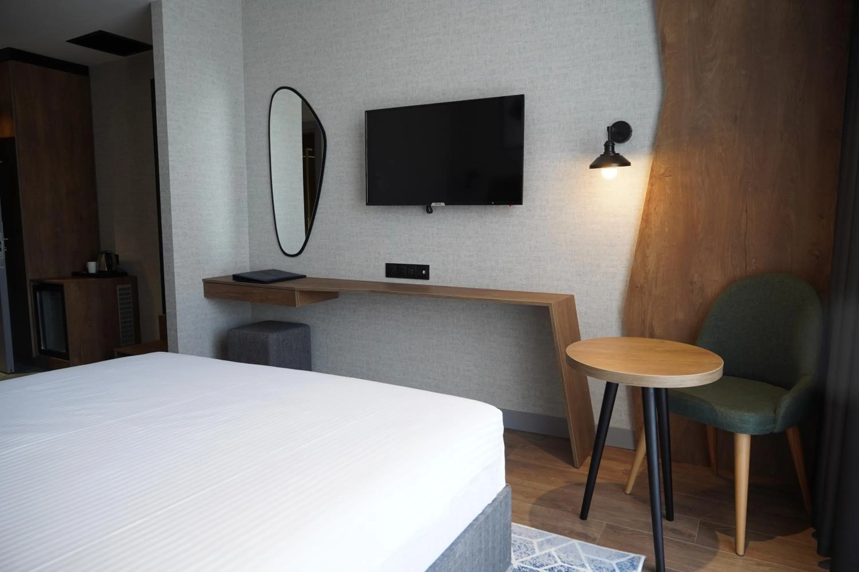 Photo of the whole room, Bed in Ramada Encore by Wyndham Istanbul Arnavutkoy