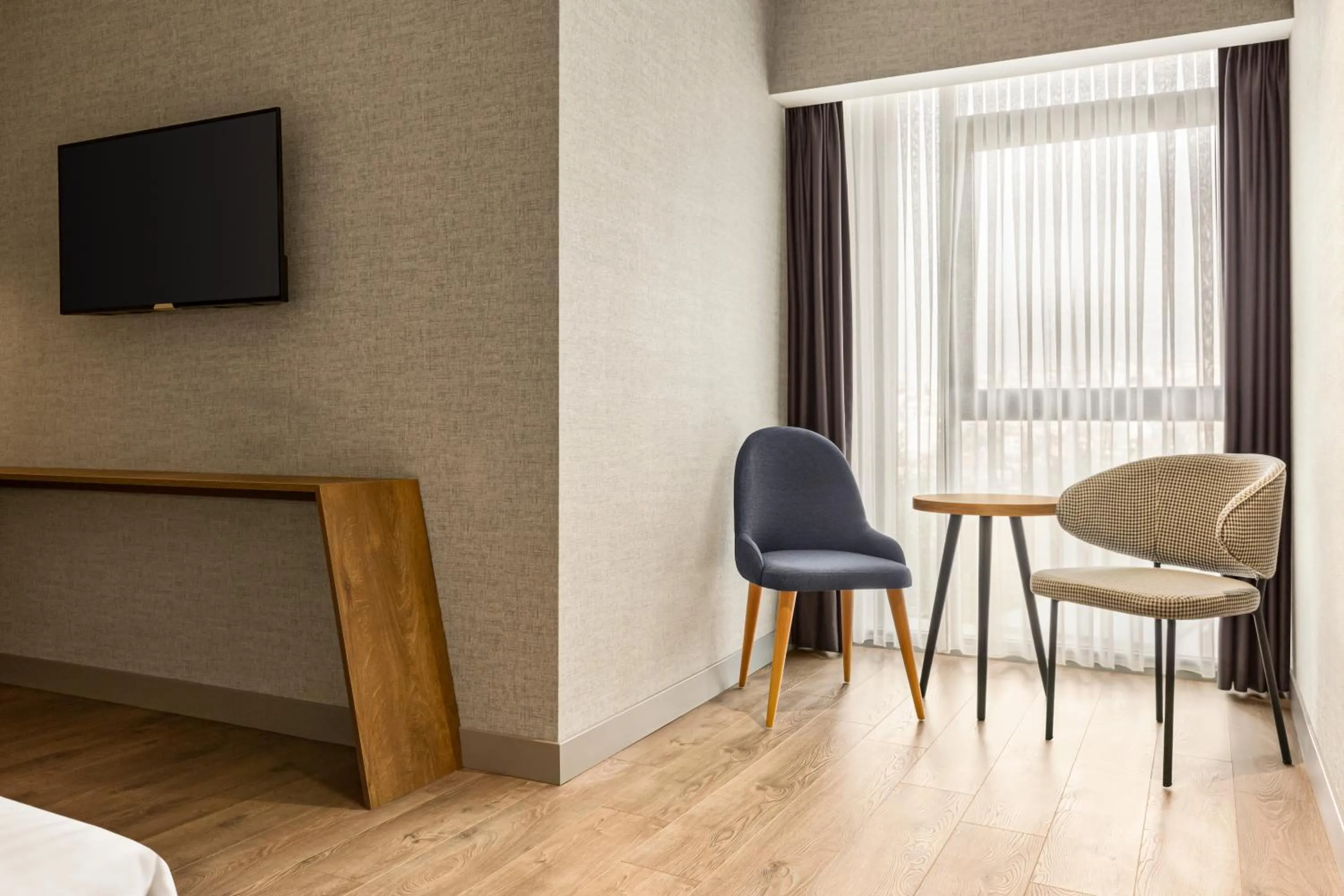 Seating area in Ramada Encore by Wyndham Istanbul Arnavutkoy