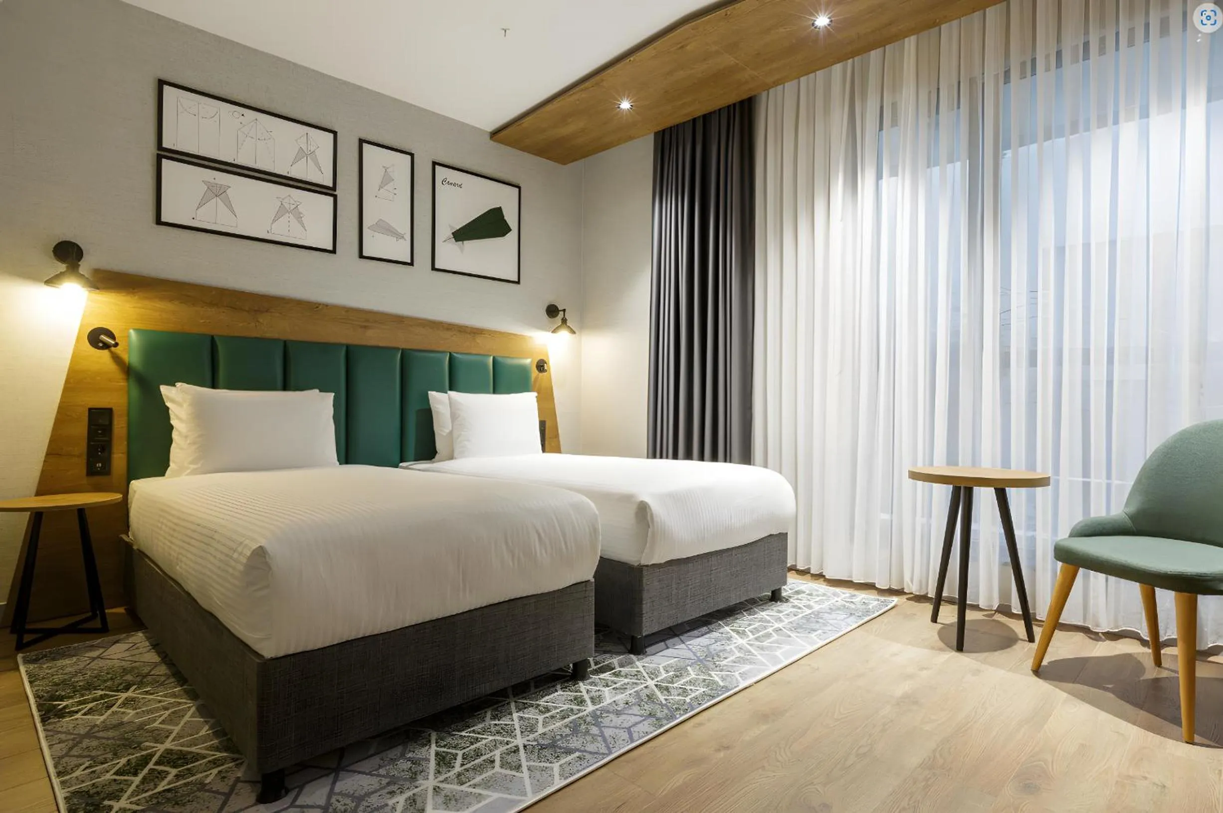 Bed in Ramada Encore by Wyndham Istanbul Arnavutkoy