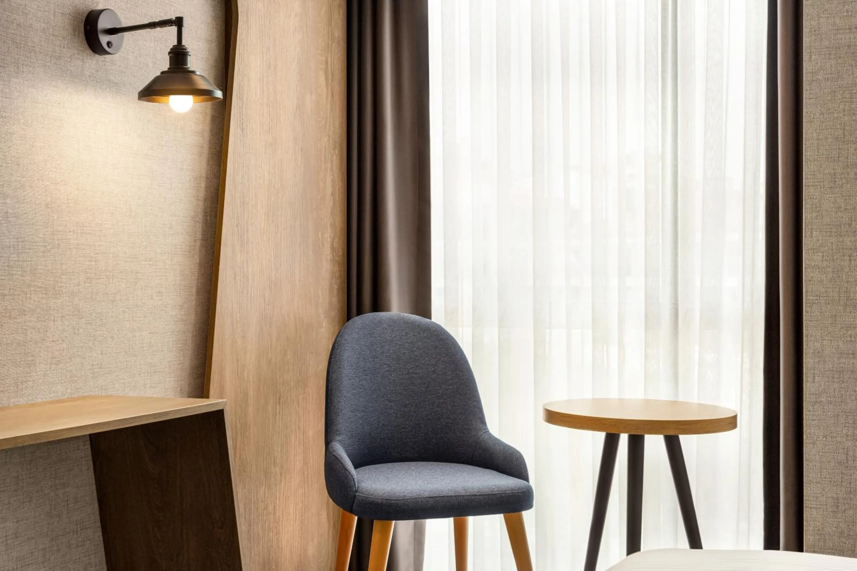 Seating area in Ramada Encore by Wyndham Istanbul Arnavutkoy