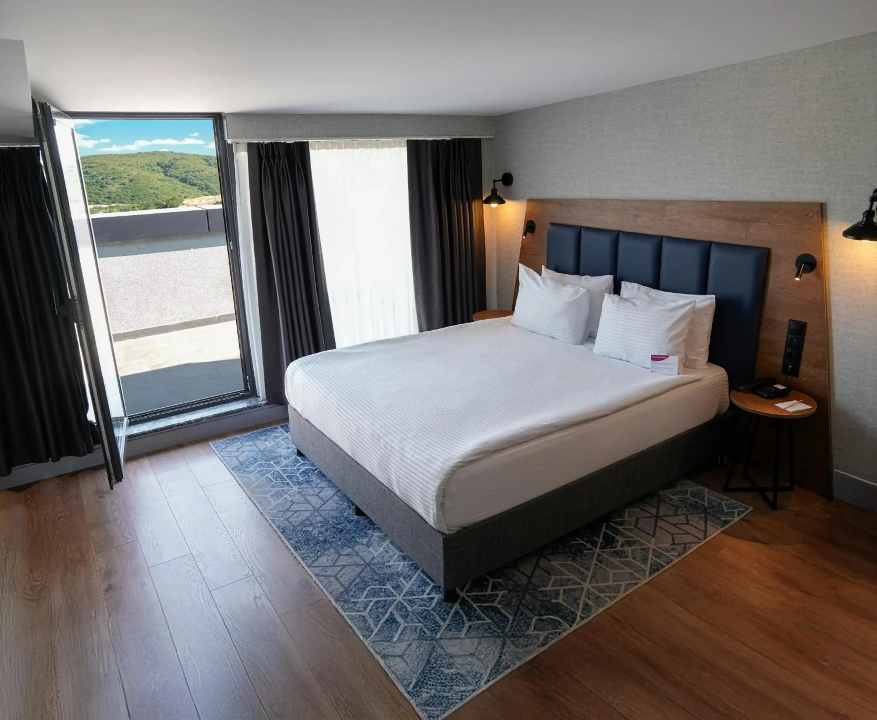 Bed in Ramada Encore by Wyndham Istanbul Arnavutkoy Bed in Ramada Encore by Wyndham Istanbul Arnavutkoy