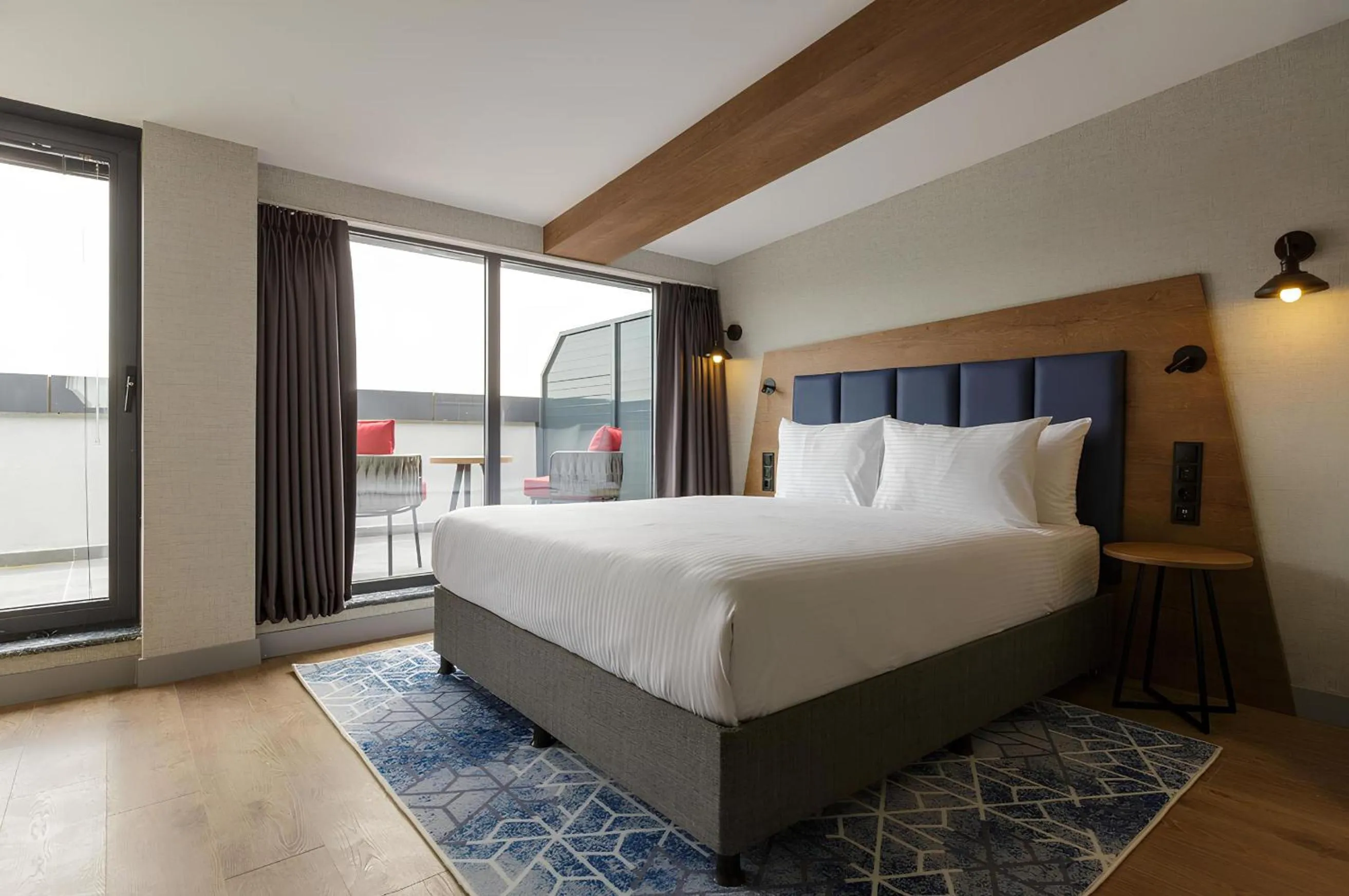 Bed in Ramada Encore by Wyndham Istanbul Arnavutkoy