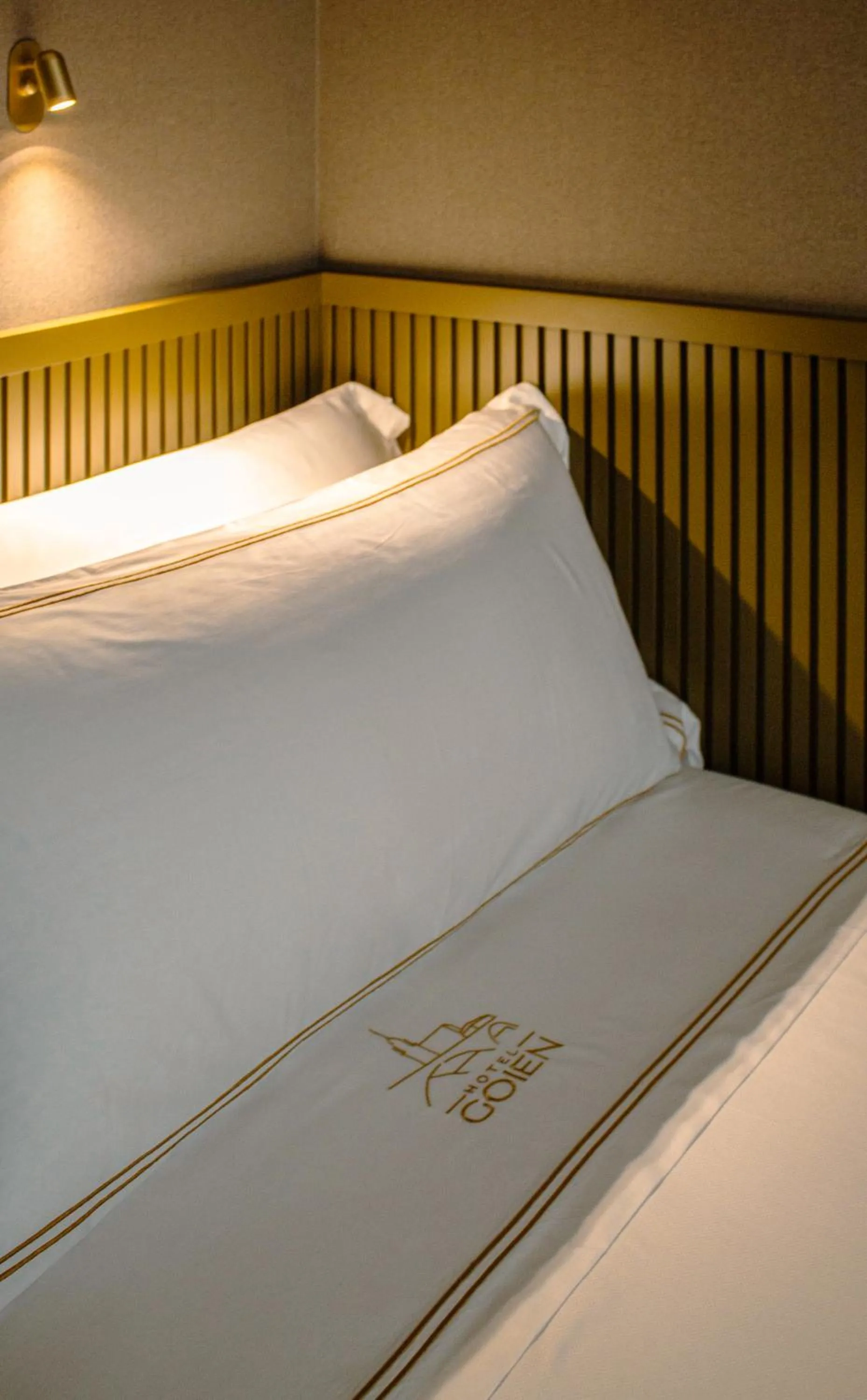 Bed in GOIEN BOUTIQUE HOTEL