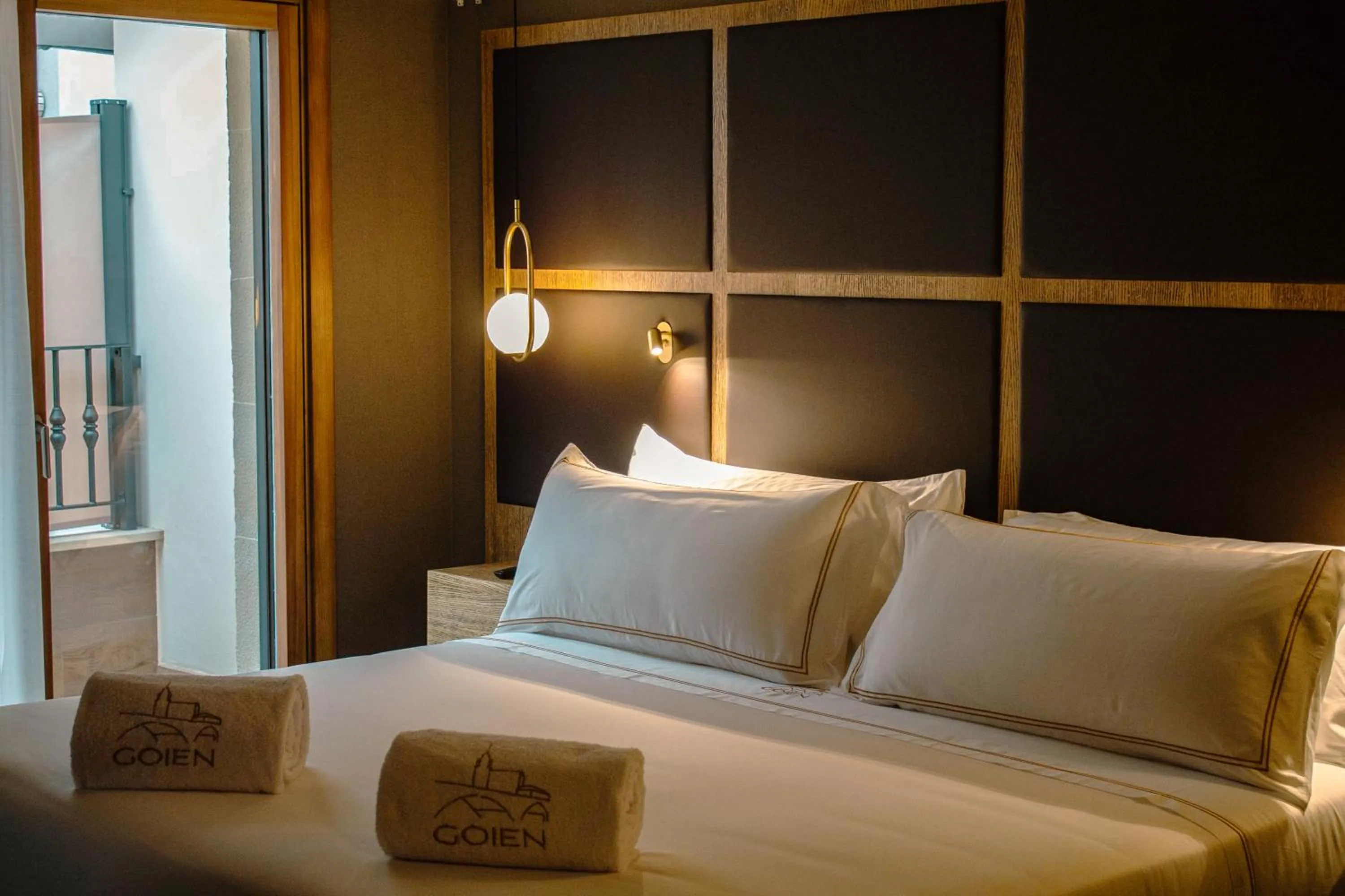 Bed in GOIEN BOUTIQUE HOTEL