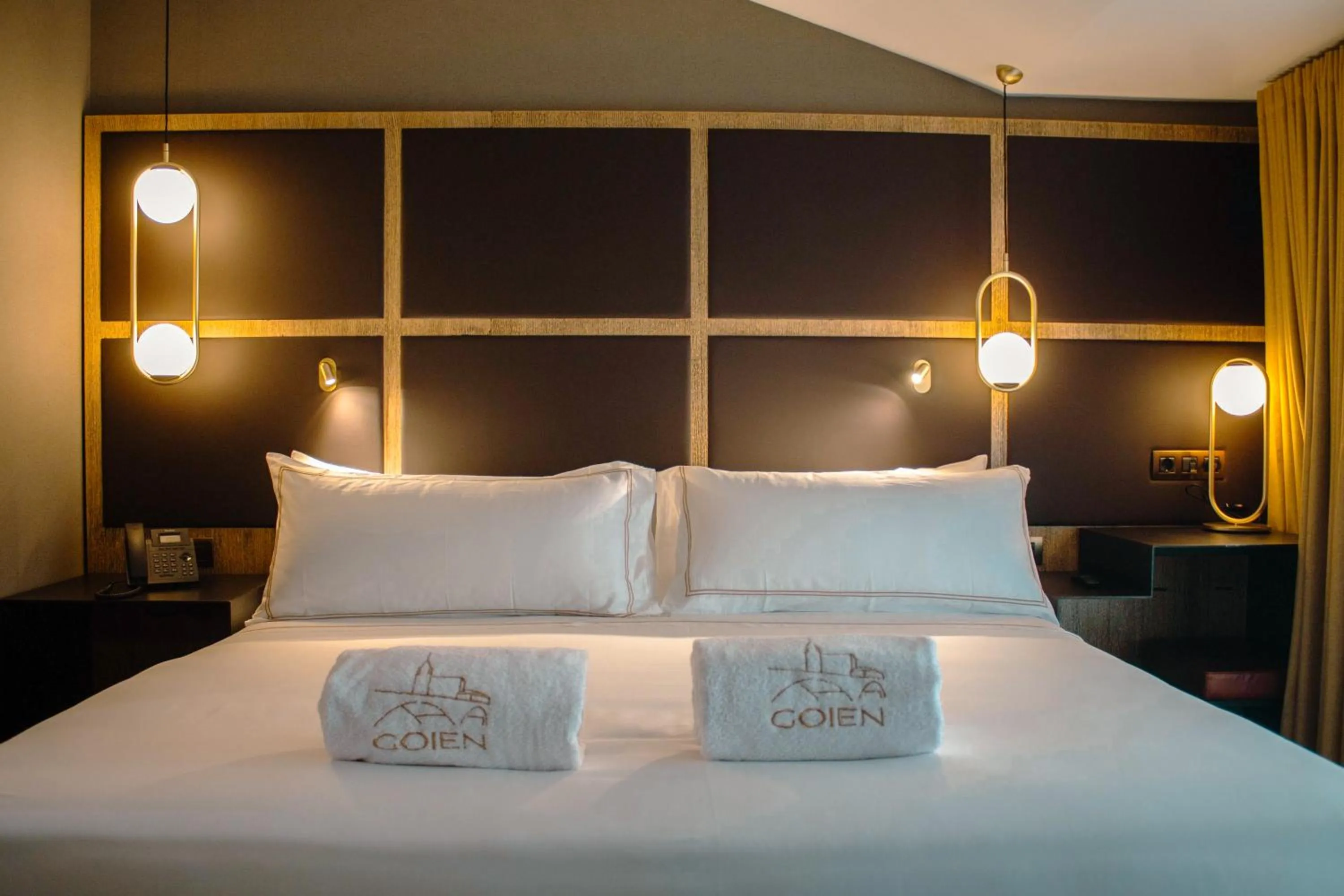 Bed in GOIEN BOUTIQUE HOTEL