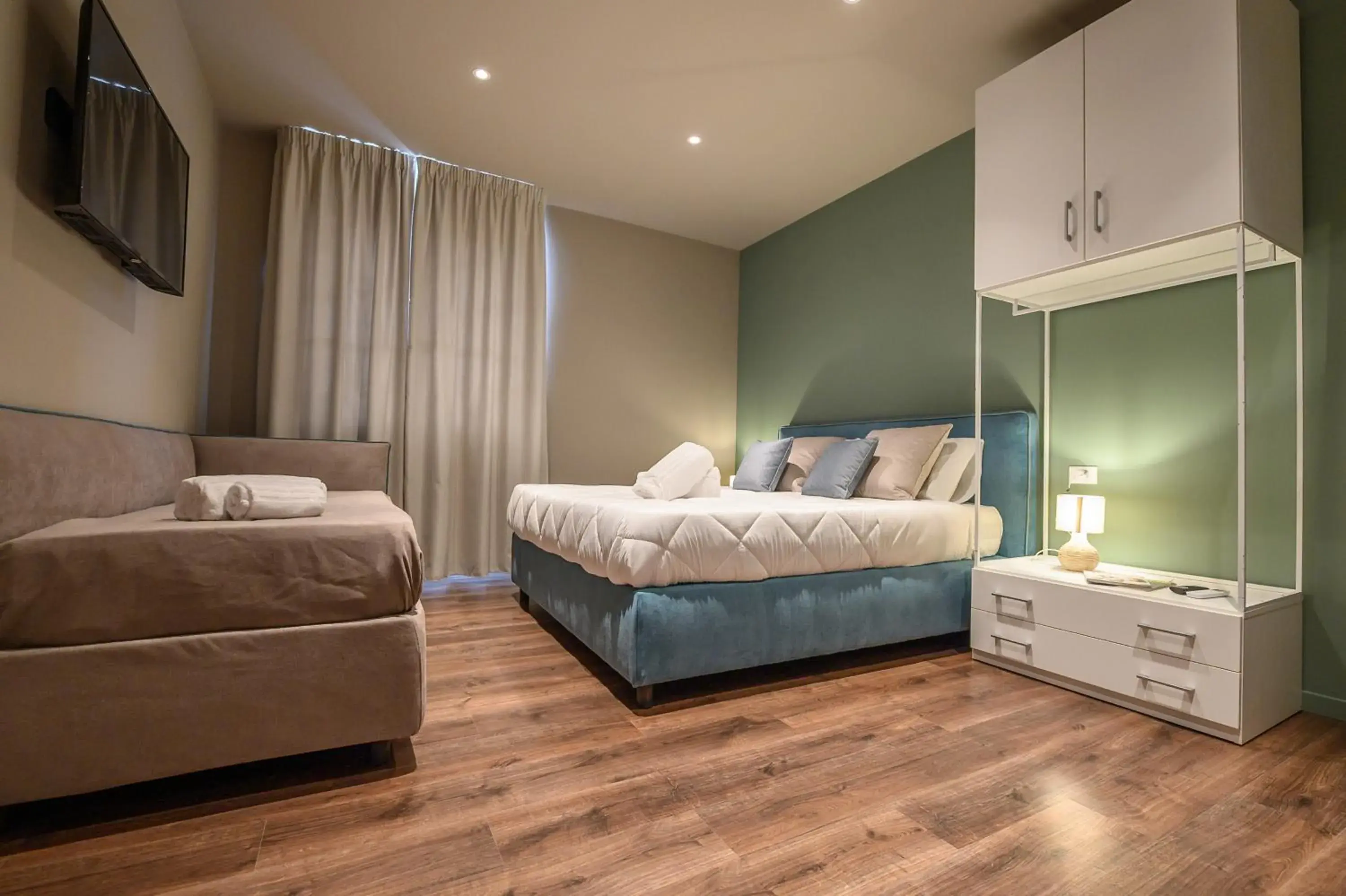 Deluxe Triple Room in Baitan Hotel Deluxe Triple Room in Baitan Hotel