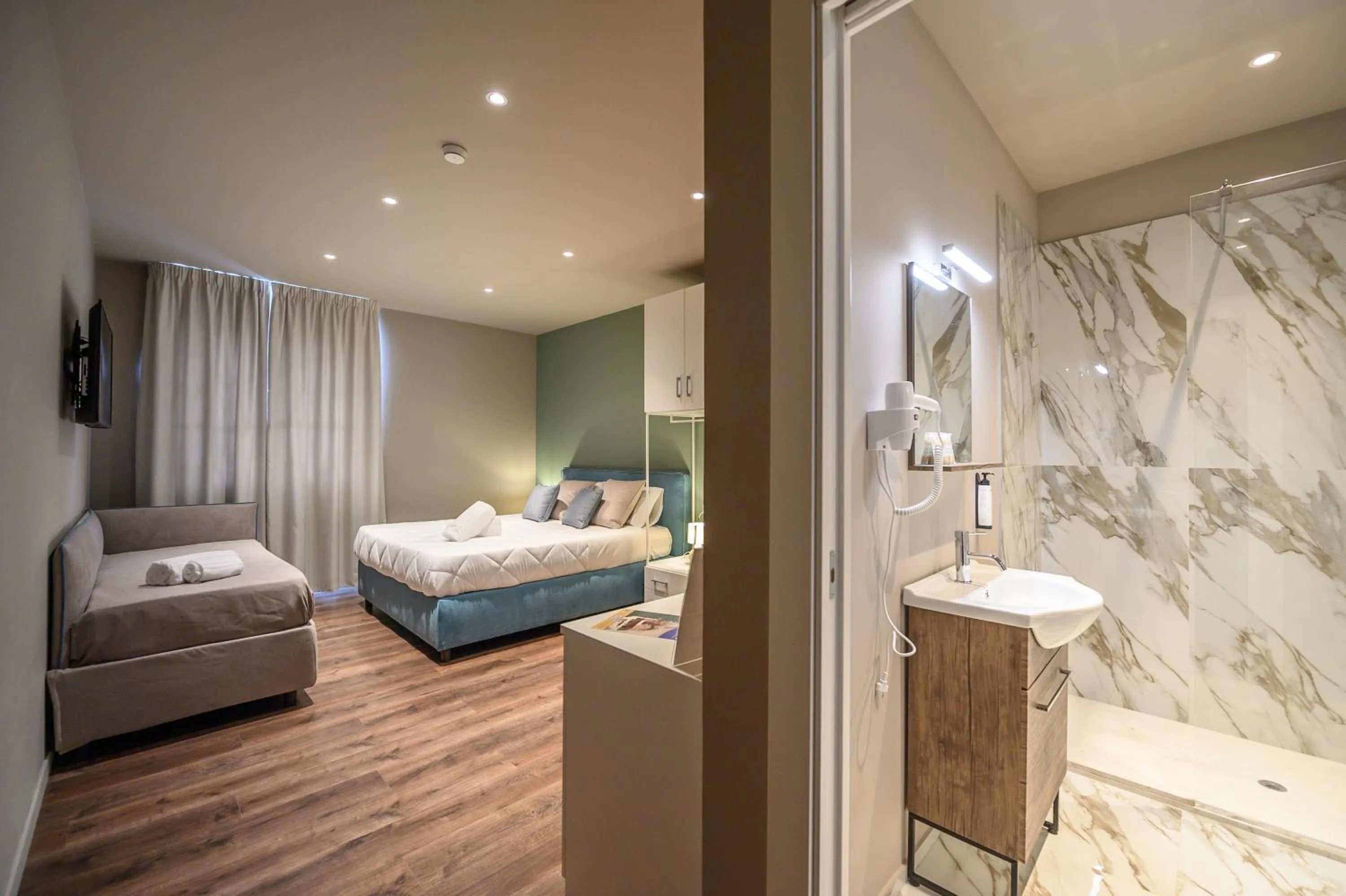 Facade/entrance, Bed in Baitan Hotel