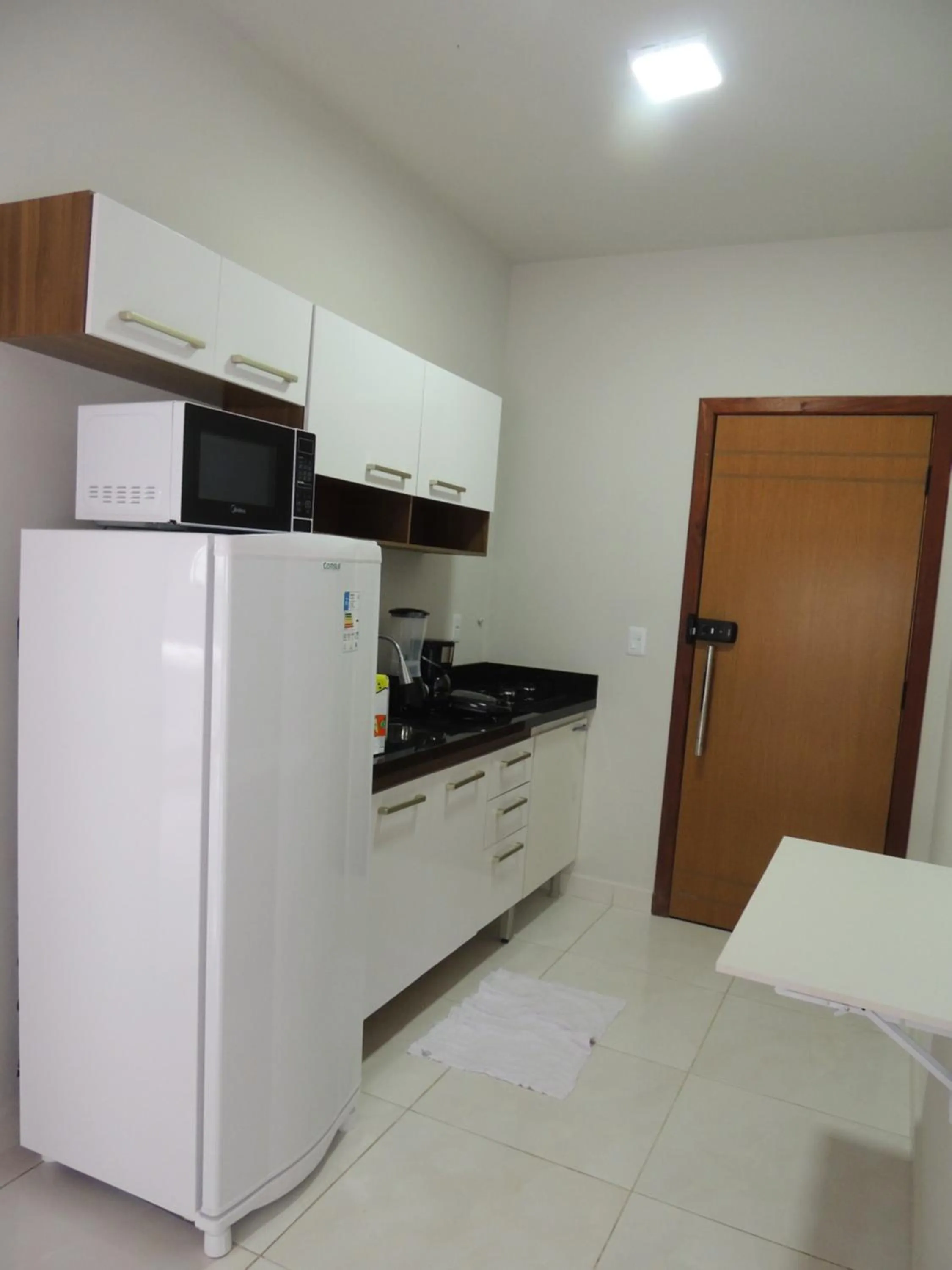 Kitchen or kitchenette in Porto Residence