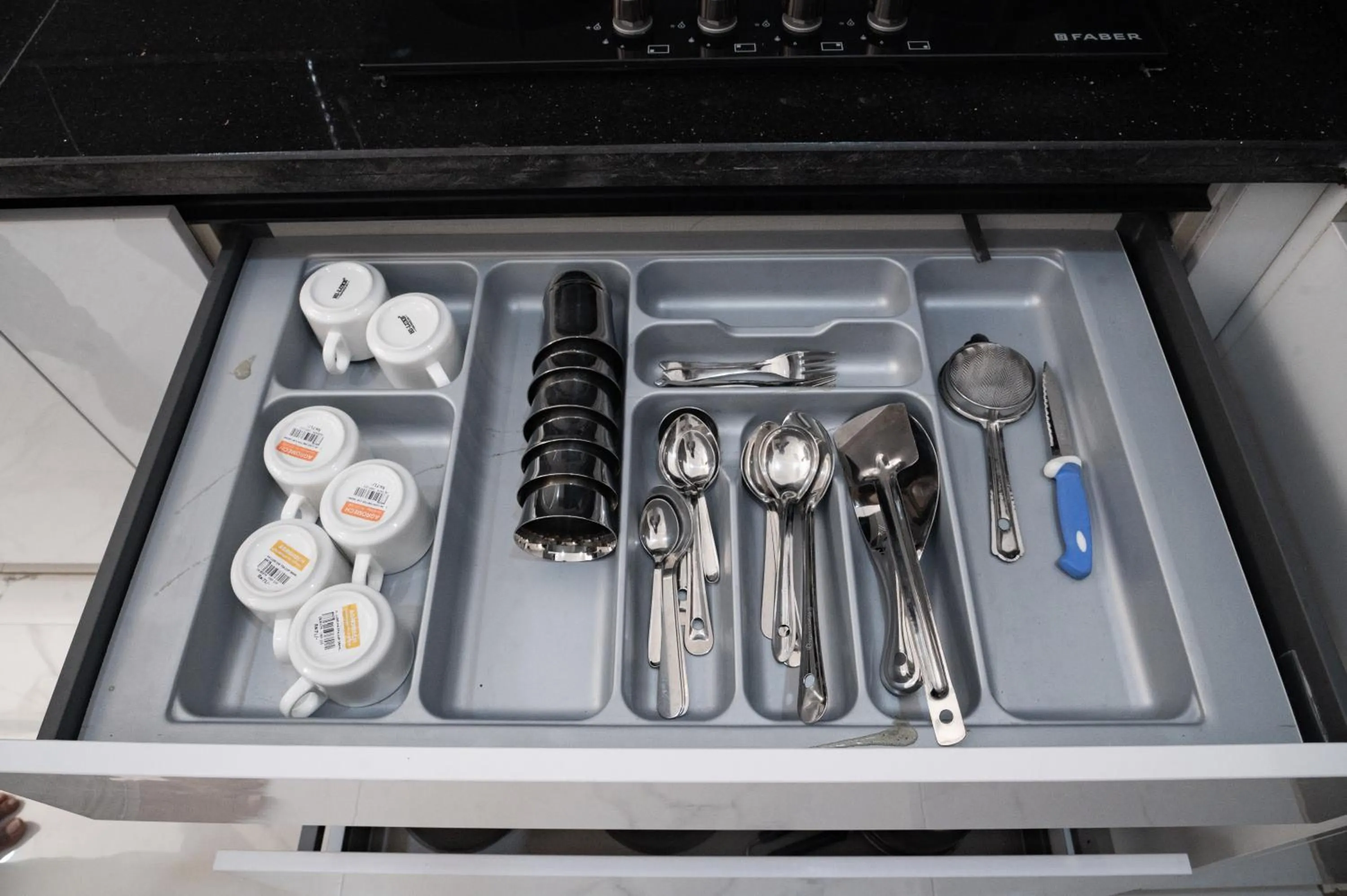 Kitchen or kitchenette in The Balcony Suites