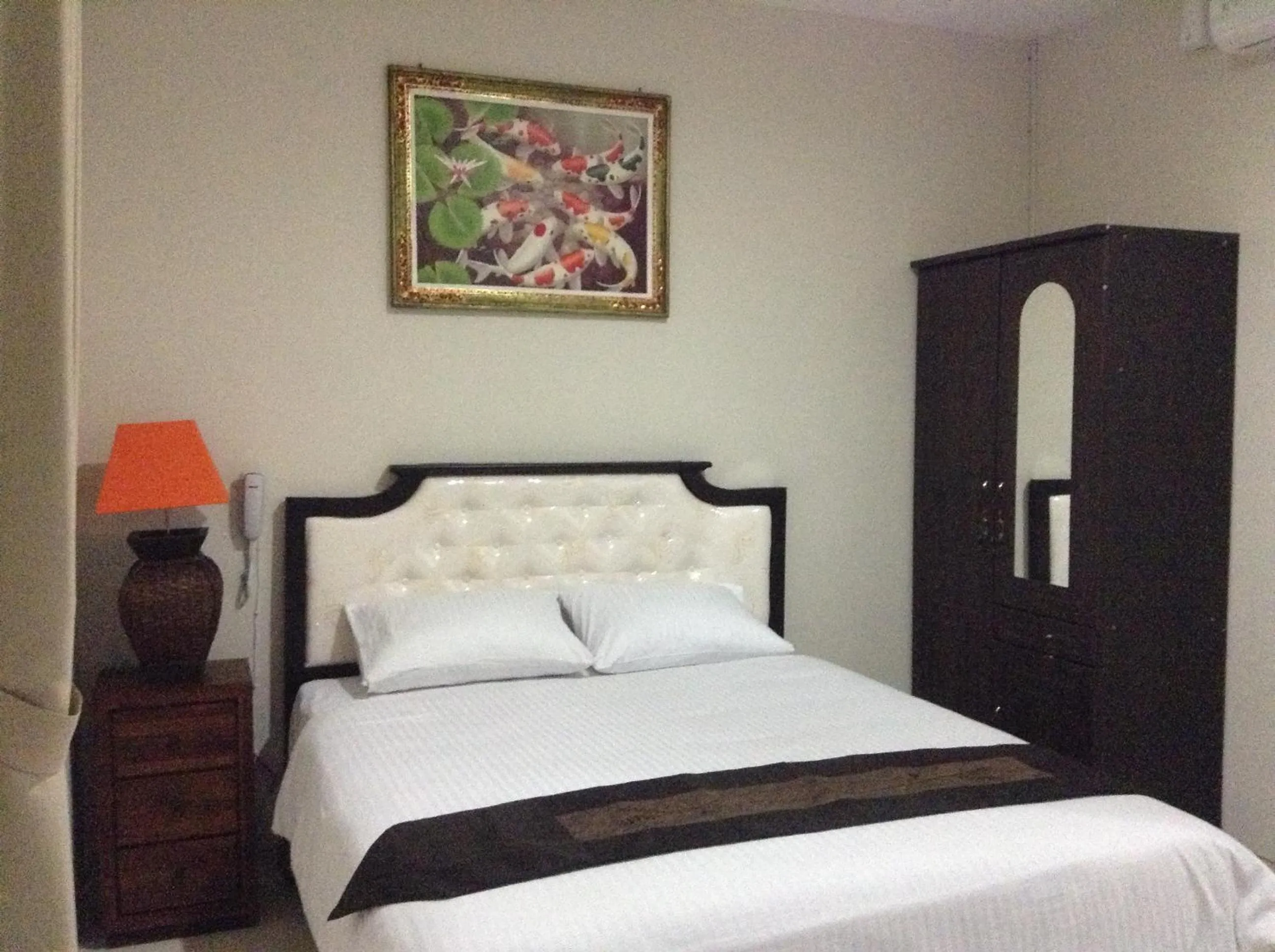 Bed in Tuban Torres Accommodation