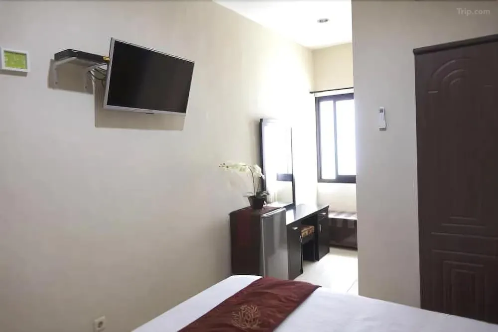 Bed in Tuban Torres Accommodation