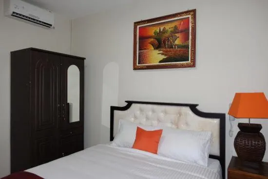 Bed in Tuban Torres Accommodation