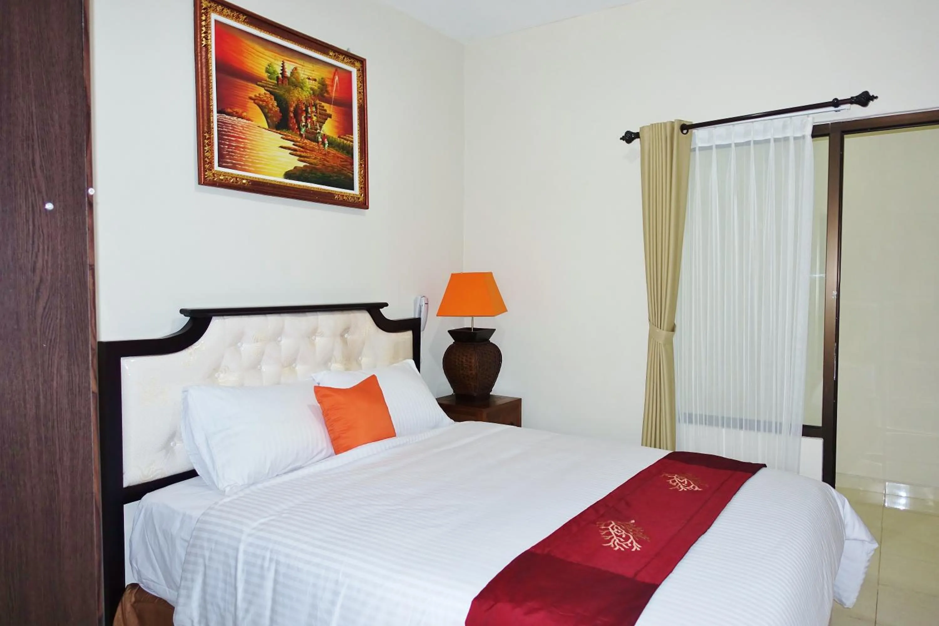 Bed in Tuban Torres Accommodation