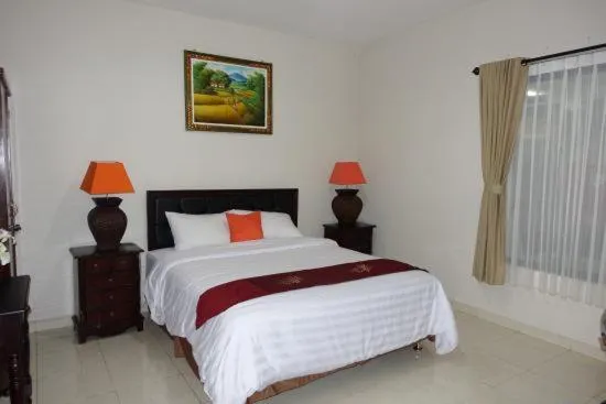 Bed in Tuban Torres Accommodation