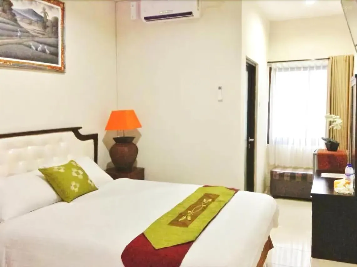 Bed in Tuban Torres Accommodation
