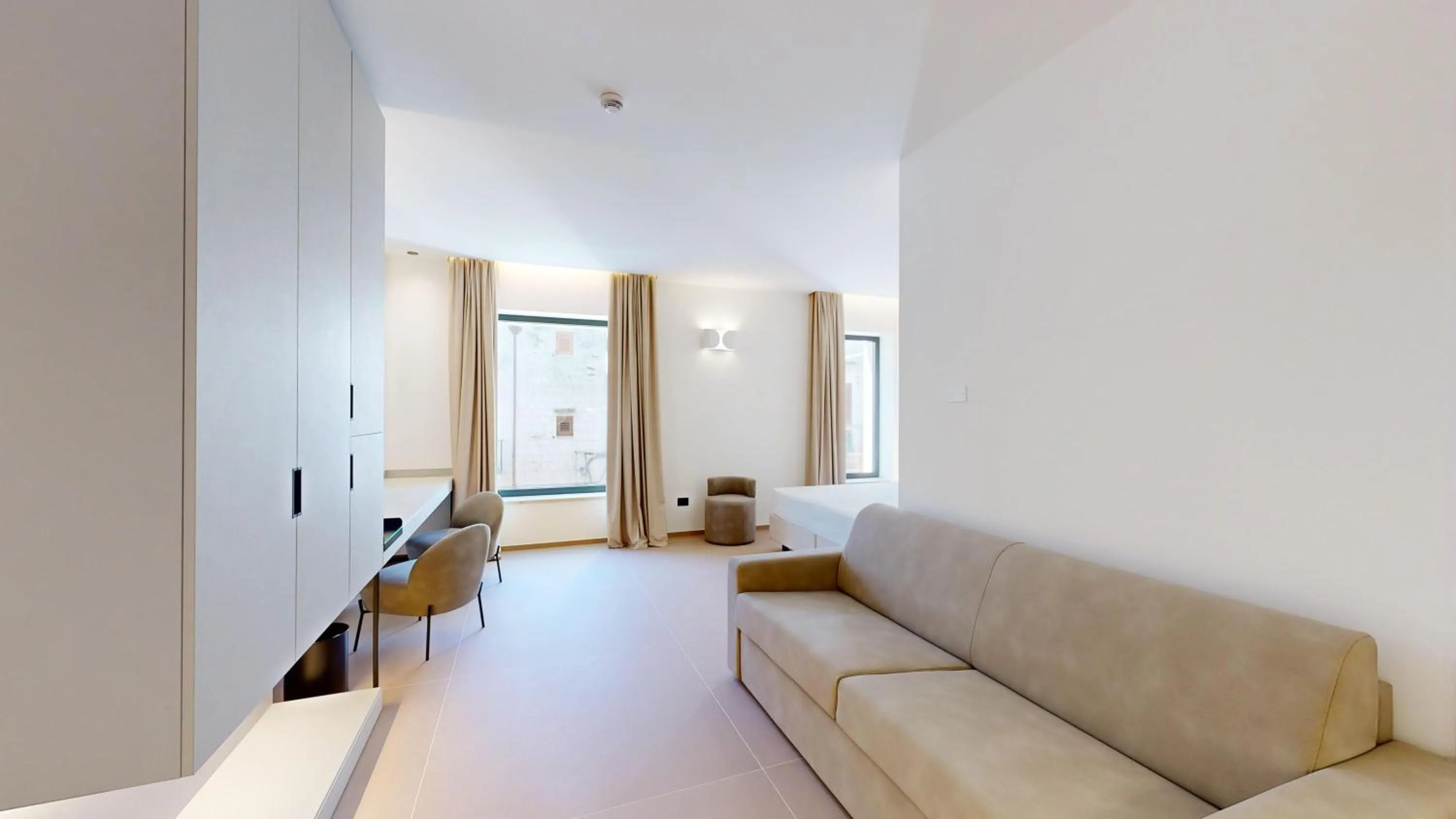 Bed in PRIMO OSTUNI HOTEL