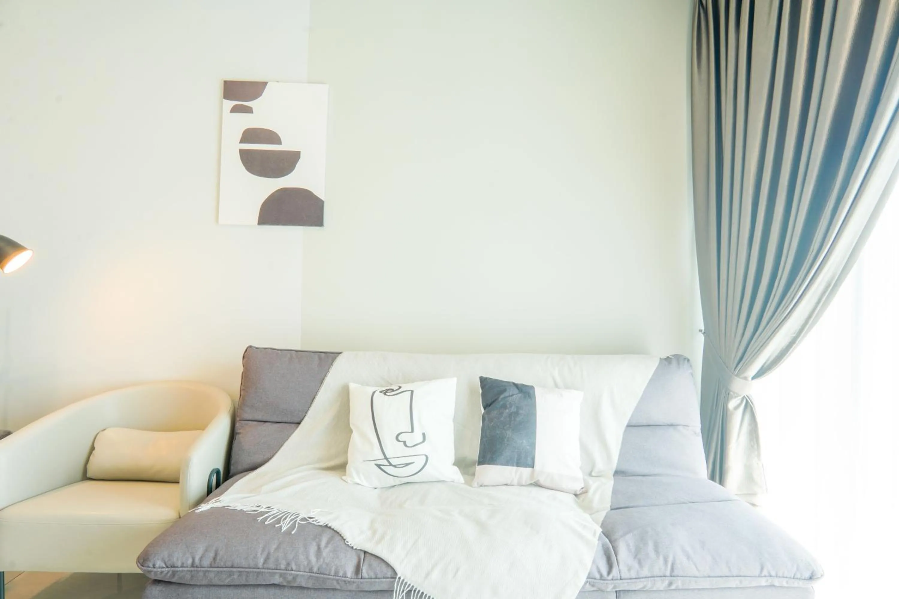 Living room, Bed in Datum Jelatek Residence by Airhost