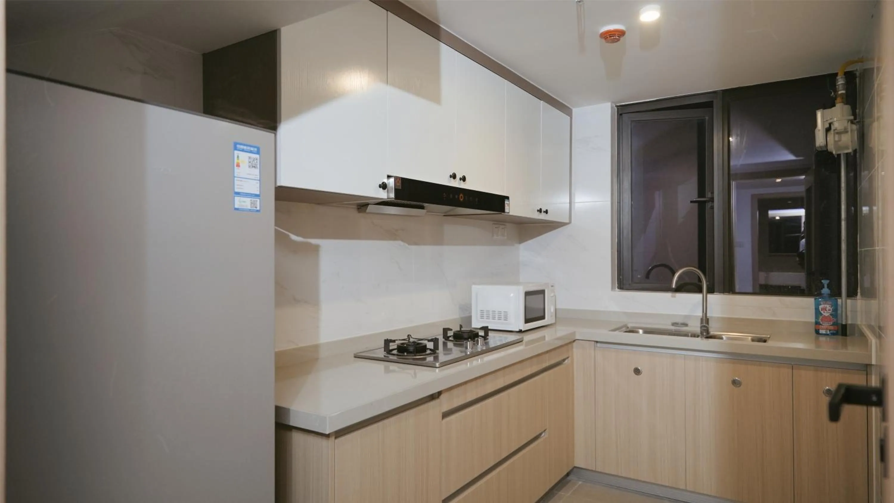 kitchen in Serveyou Serviced Apartment Zengcheng Branch-Free Airport Pickup & Free Canton Fair shuttle