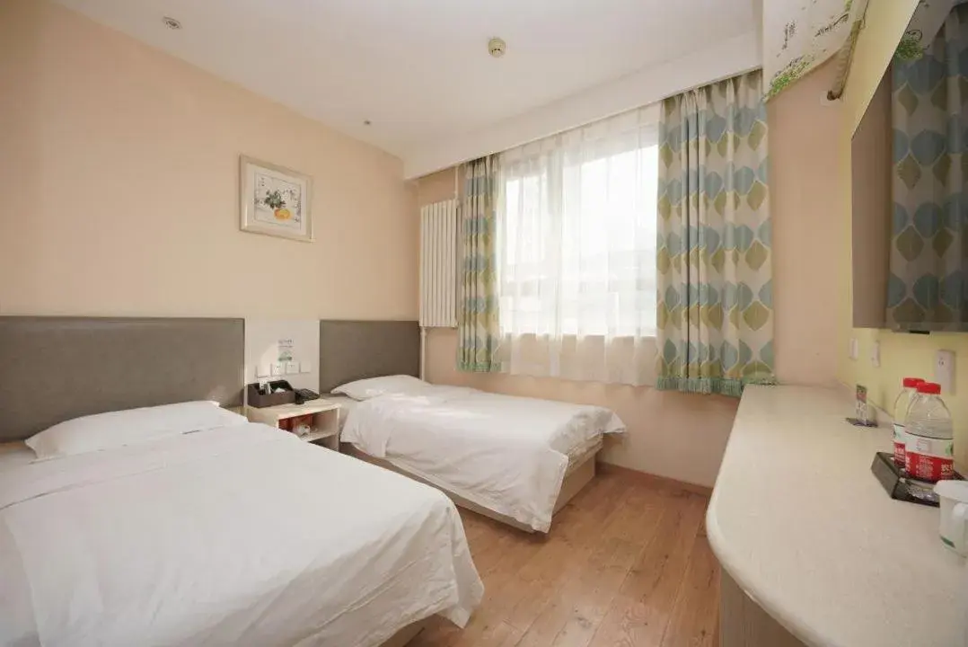 Bed in Beijing Dongdan Hotel Near Wangfujing Street,Tian'AnMen Square,The Forbidden City,Free self-service laundry room Bed in Beijing Dongdan Hotel Near Wangfujing Street,Tian'AnMen Square,The Forbidden City,Free self-service laundry room