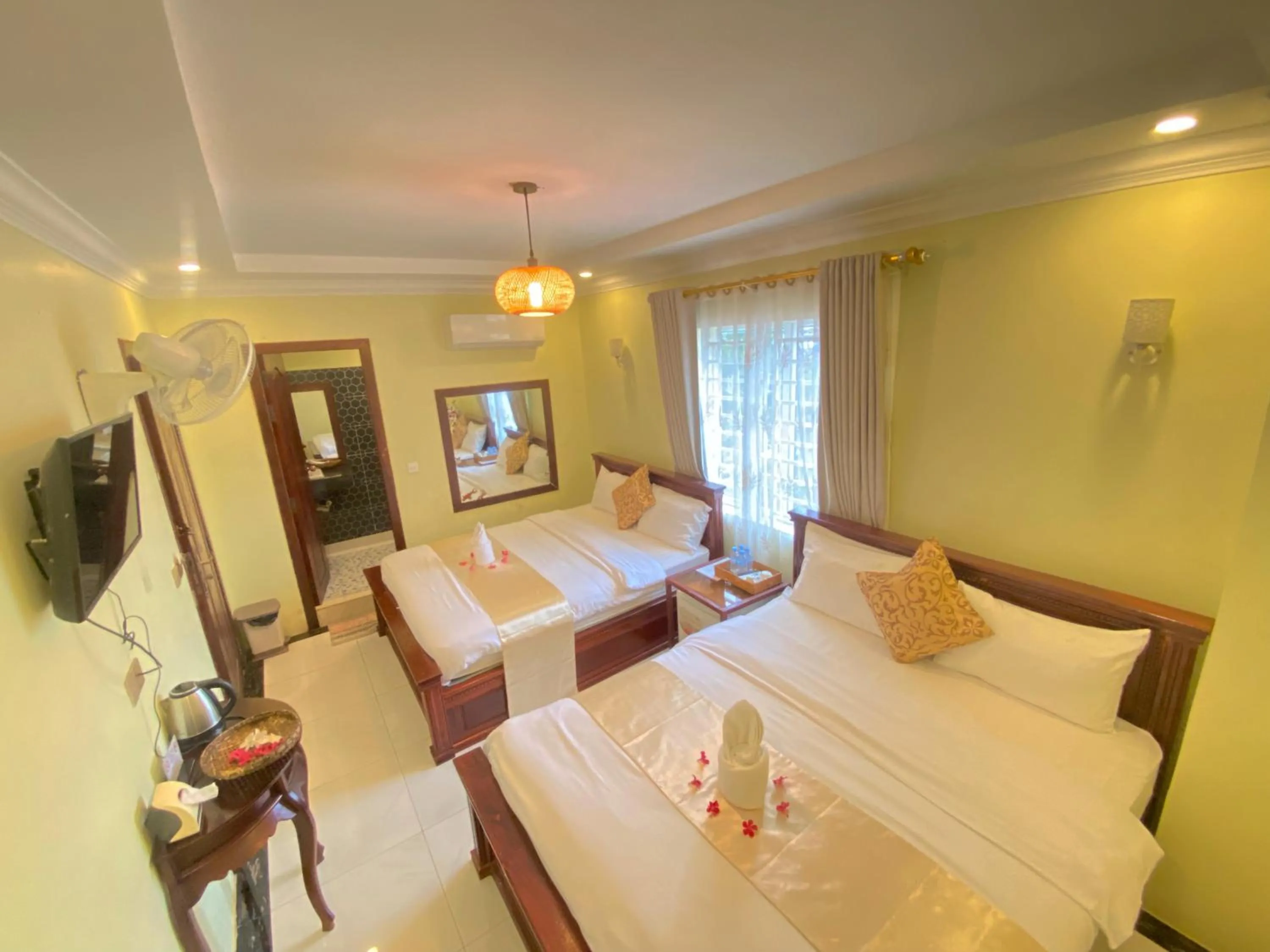 Bed in AHHA Boutique Kampot