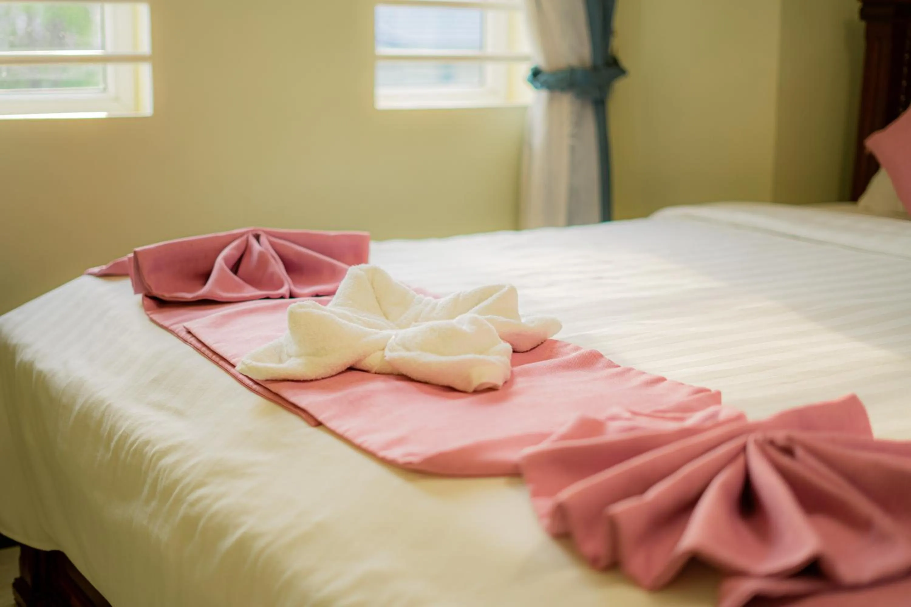 Bed in AHHA Boutique Kampot