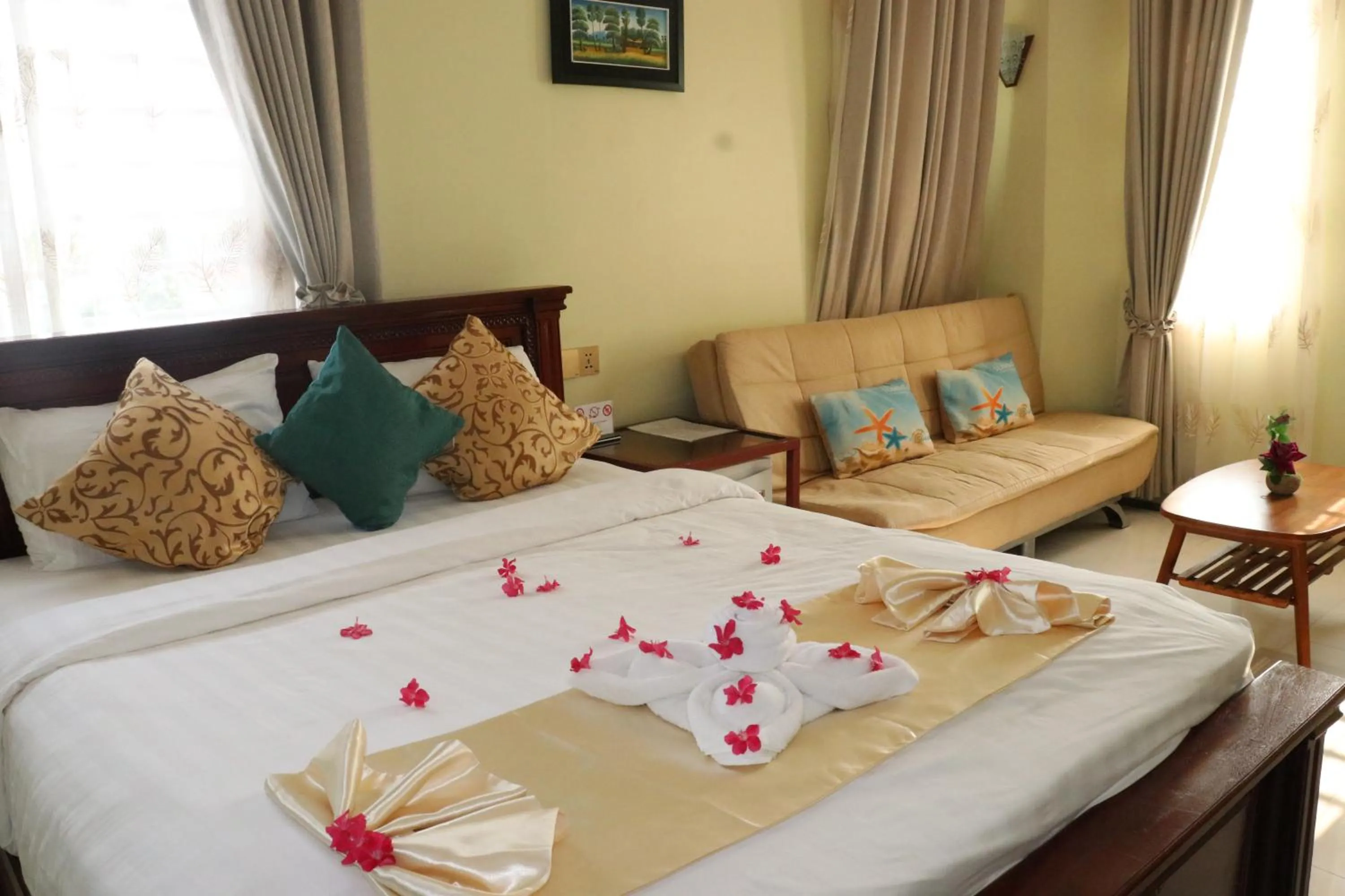Bed in AHHA Boutique Kampot
