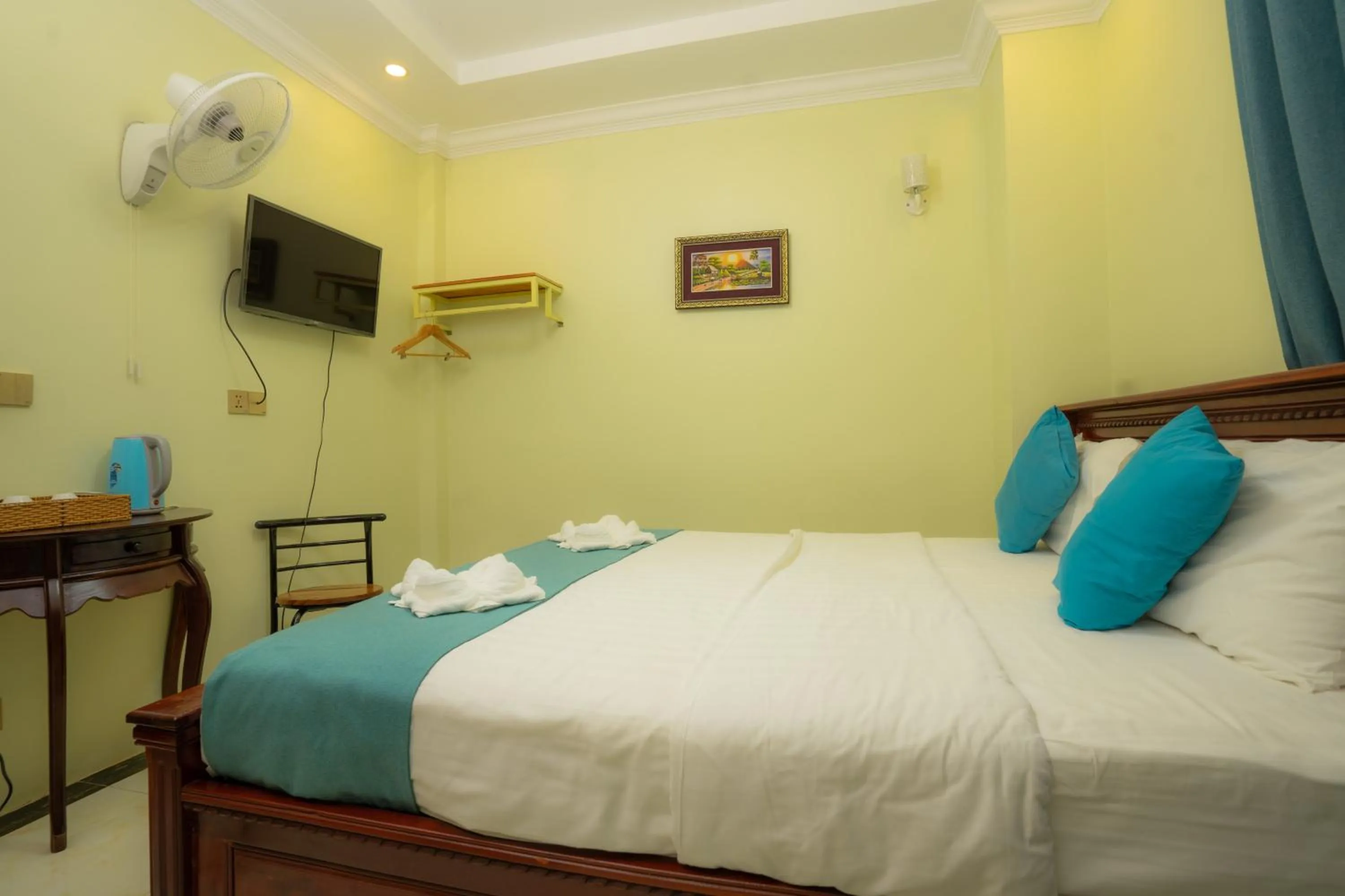 Bed in AHHA Boutique Kampot