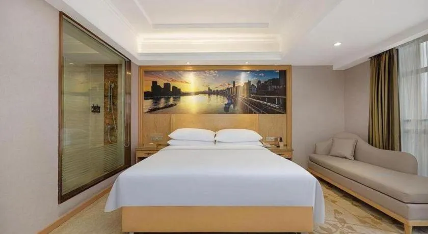 Bed in Vienna Hotel Chongqing Yongchuan High-Speed Railway Station Xinglong Lake