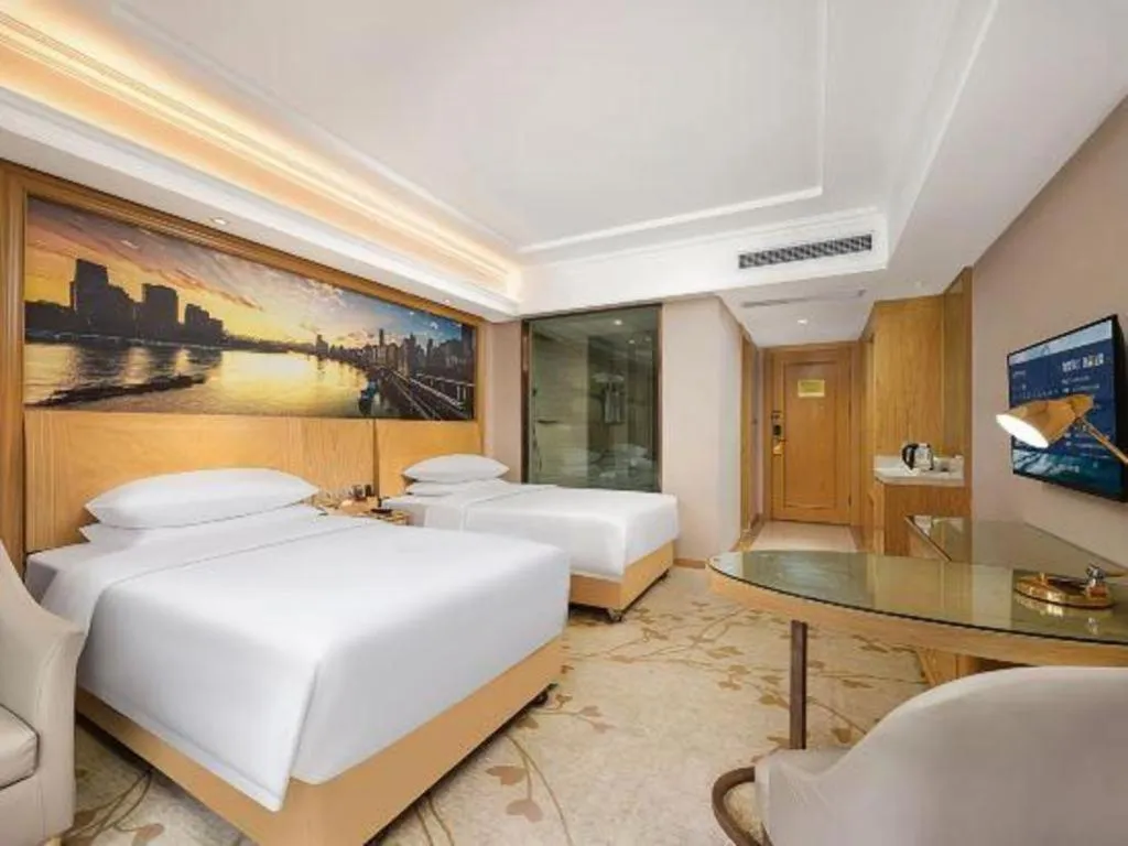 Bed in Vienna Hotel Chongqing Yongchuan High-Speed Railway Station Xinglong Lake