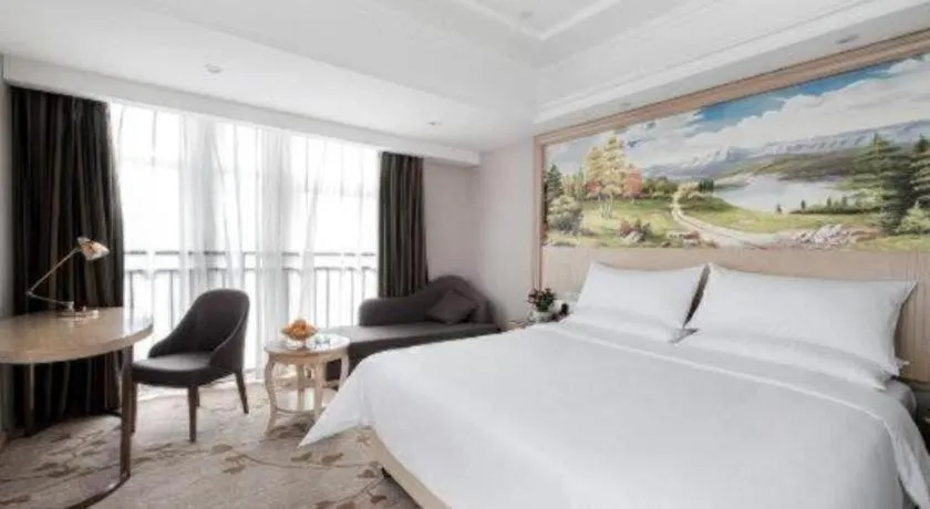 Bed in Vienna Hotel Chongqing Yongchuan High-Speed Railway Station Xinglong Lake