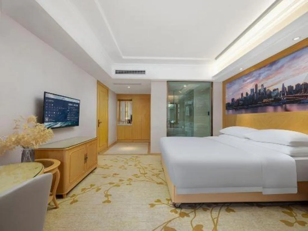 Bed in Vienna Hotel Chongqing Yongchuan High-Speed Railway Station Xinglong Lake