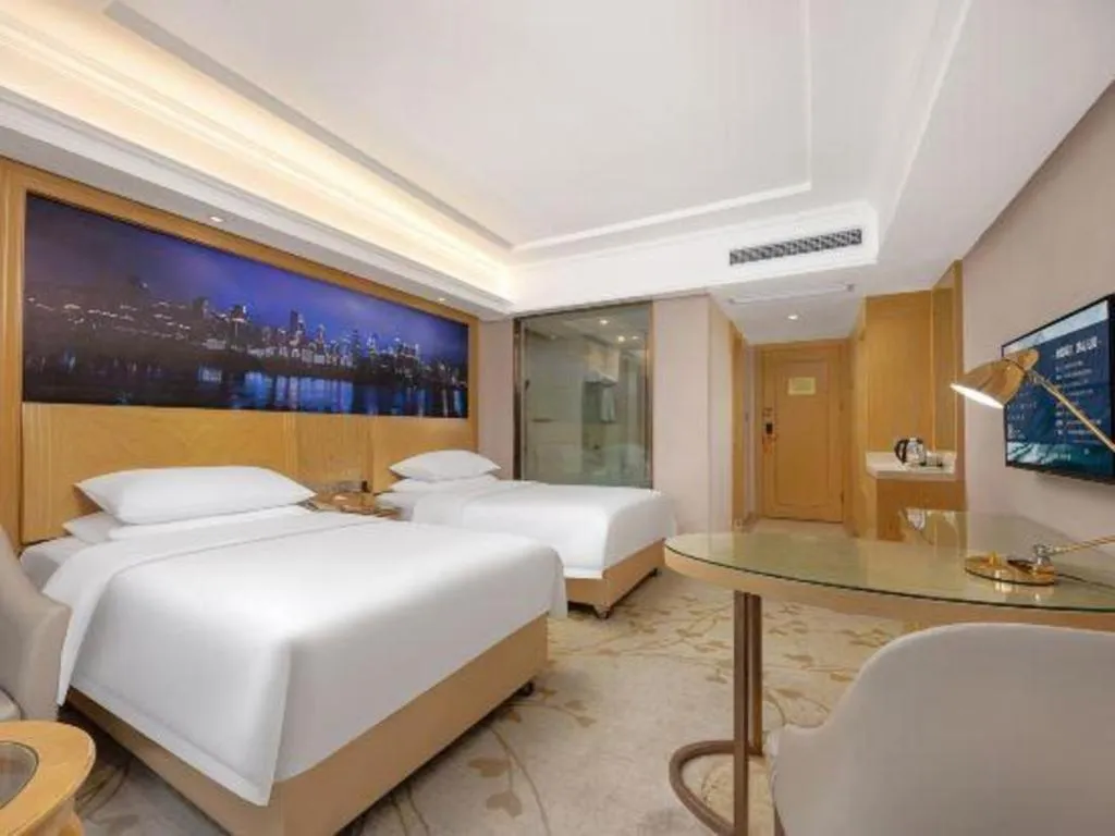 Bed in Vienna Hotel Chongqing Yongchuan High-Speed Railway Station Xinglong Lake