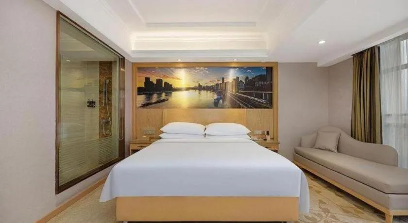 Bed in Vienna Hotel Chongqing Yongchuan High-Speed Railway Station Xinglong Lake