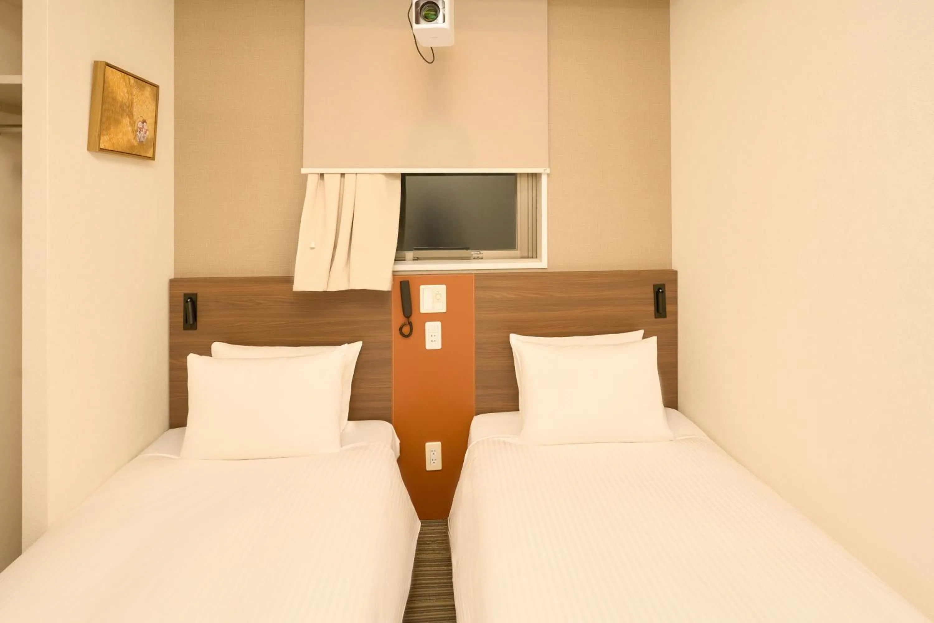 Bed in Nplus HOTEL Tokyo Nihonbashi