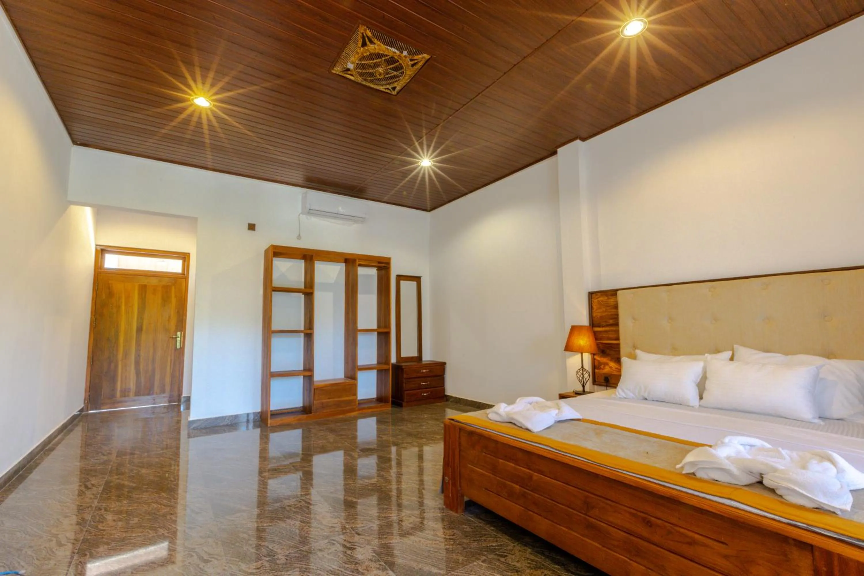 Bed in Elysia Sigiriya Hotel