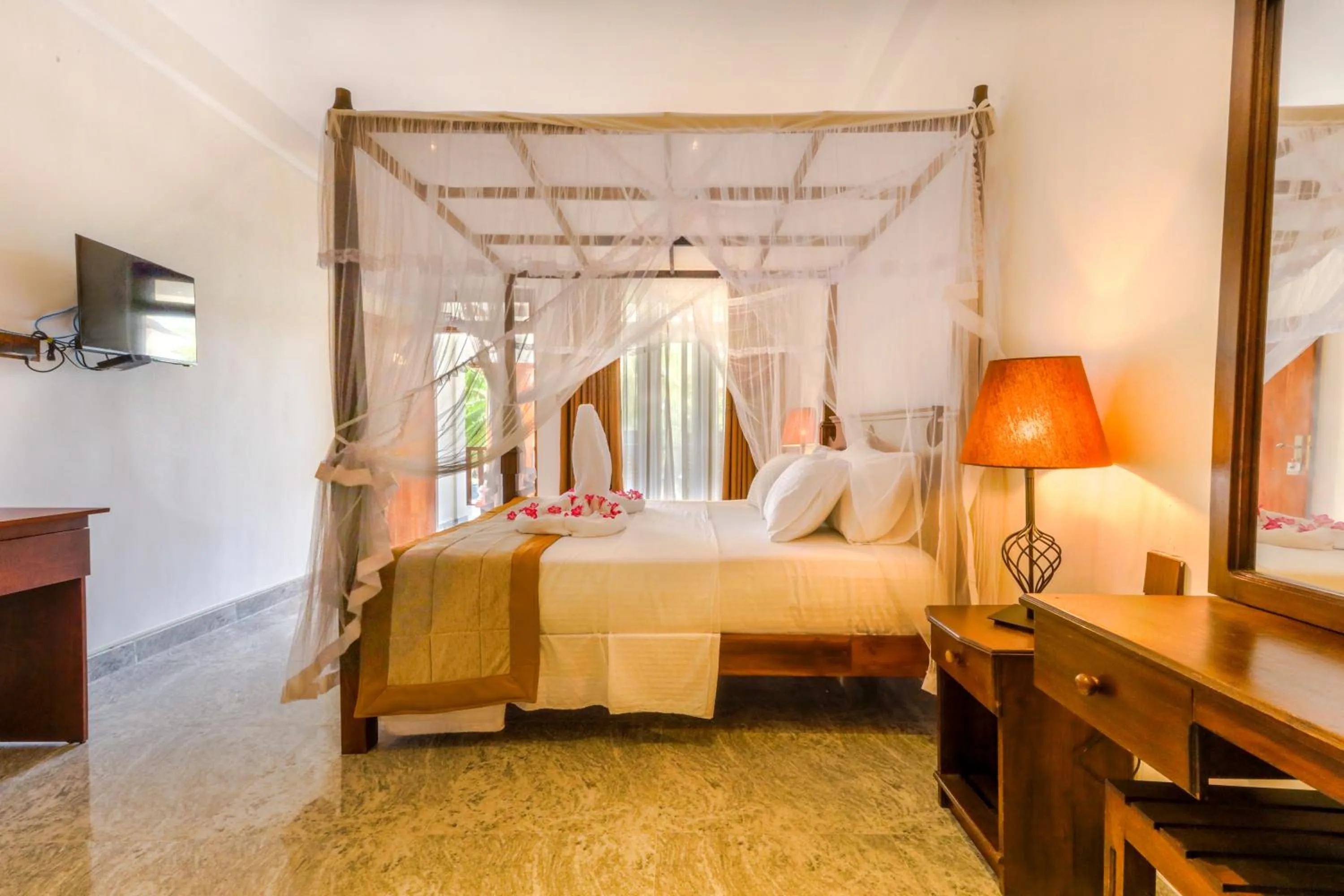 Bed in Elysia Sigiriya Hotel