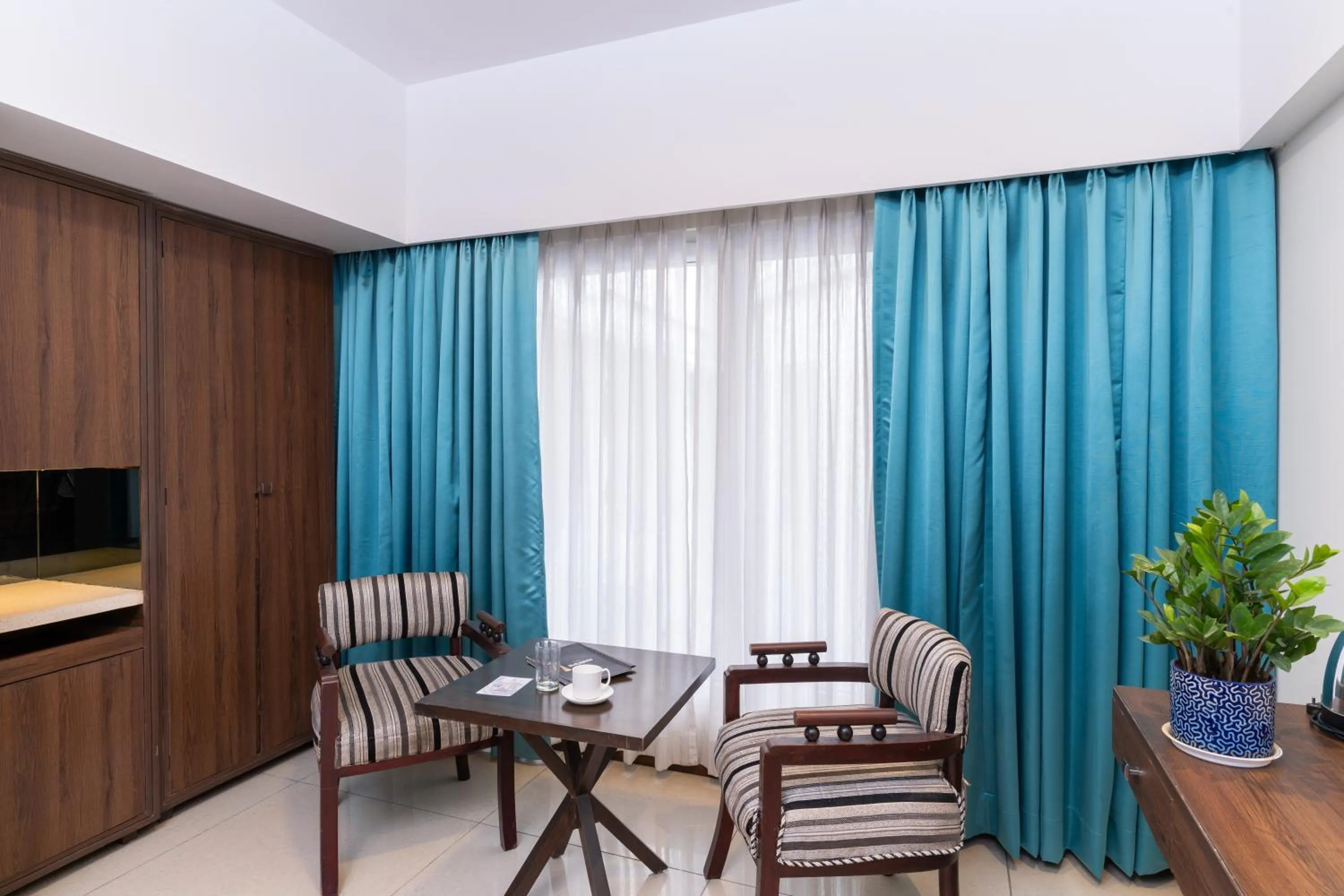 Seating area in Pincode Hotels by Yatri Nivas