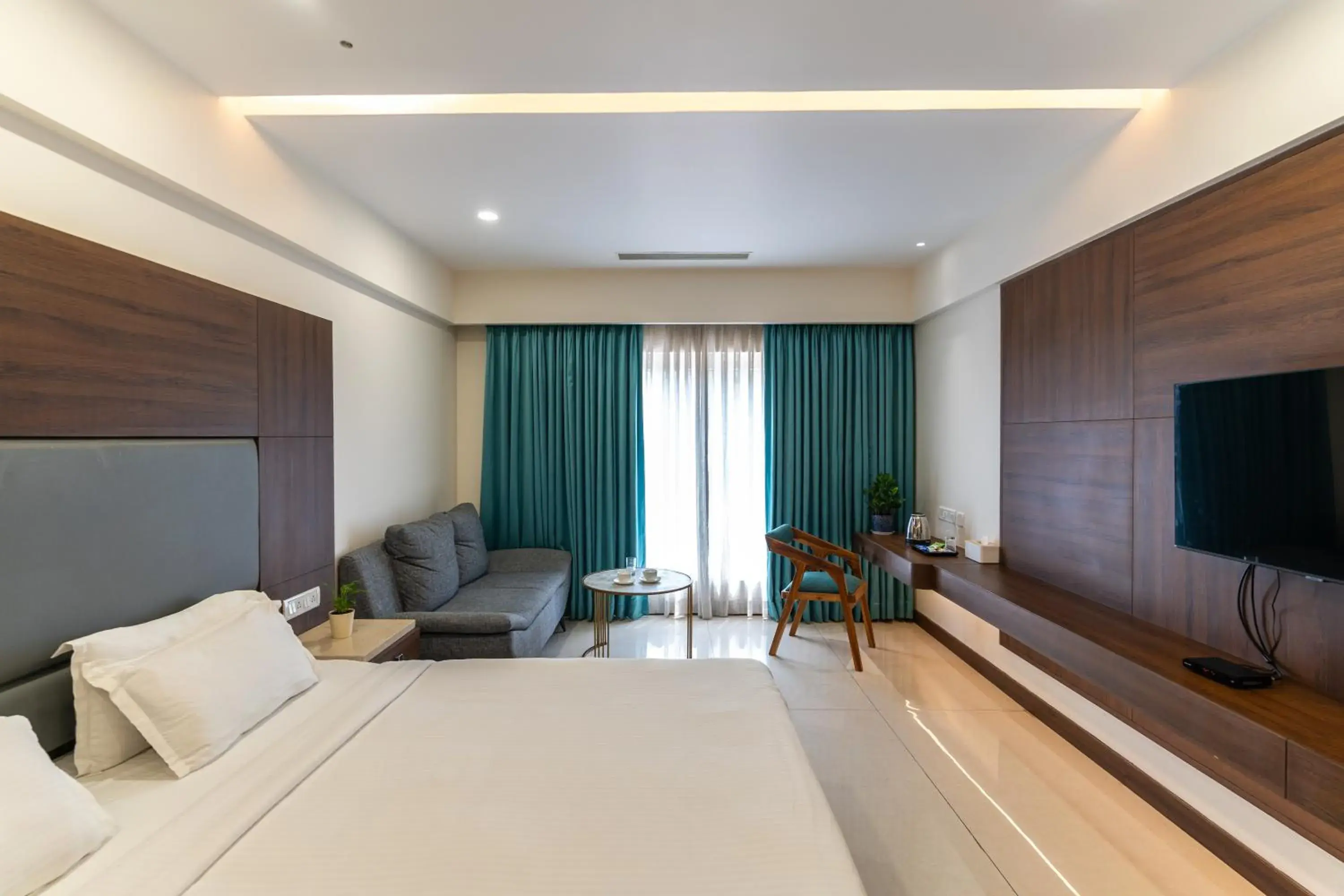 Communal lounge/ TV room, Bed in Pincode Hotels by Yatri Nivas Communal lounge/ TV room, Bed in Pincode Hotels by Yatri Nivas