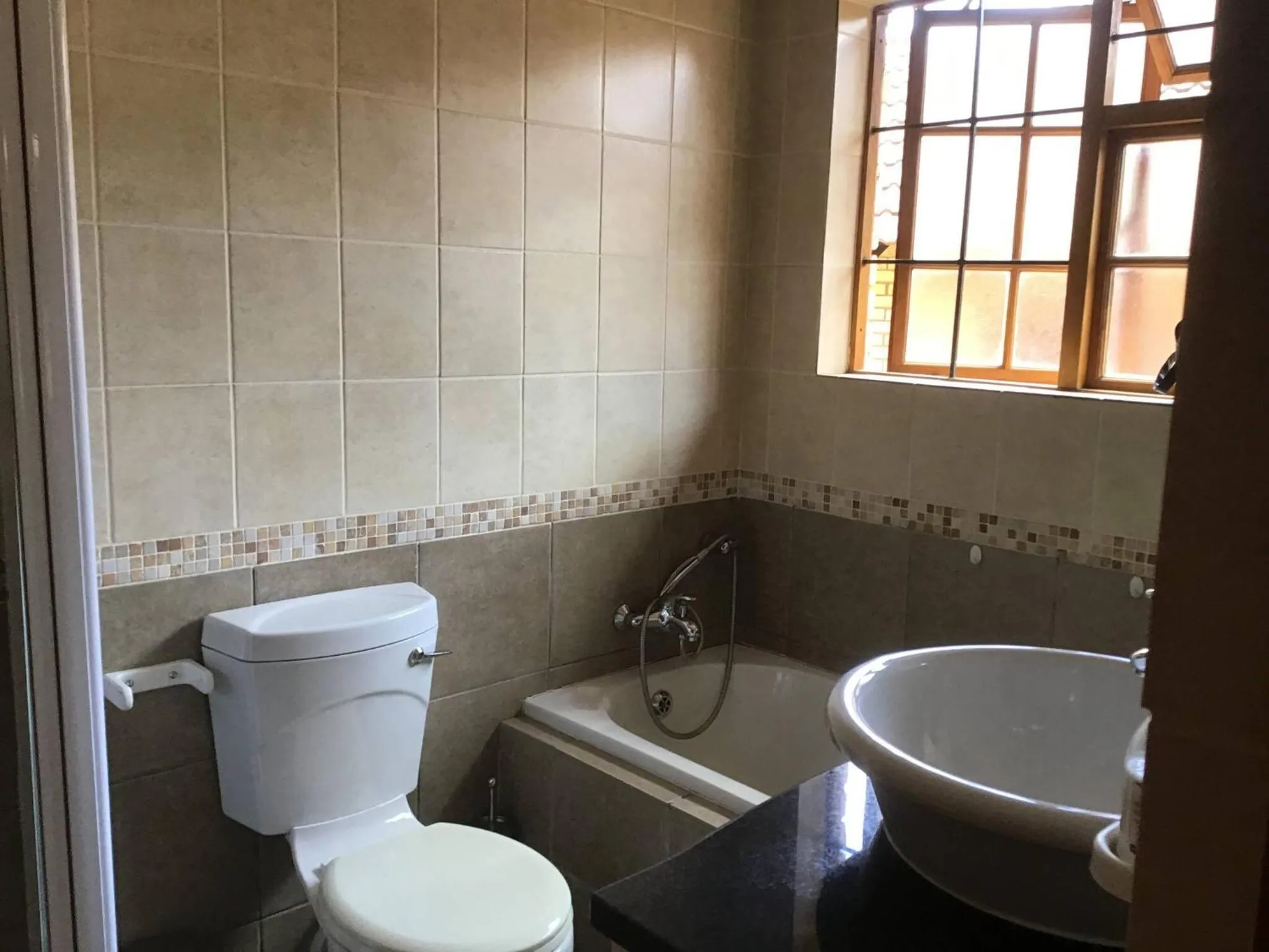 Toilet in Cozy 2BR 2BR Townhouse Netflix Private Parking Great Location
