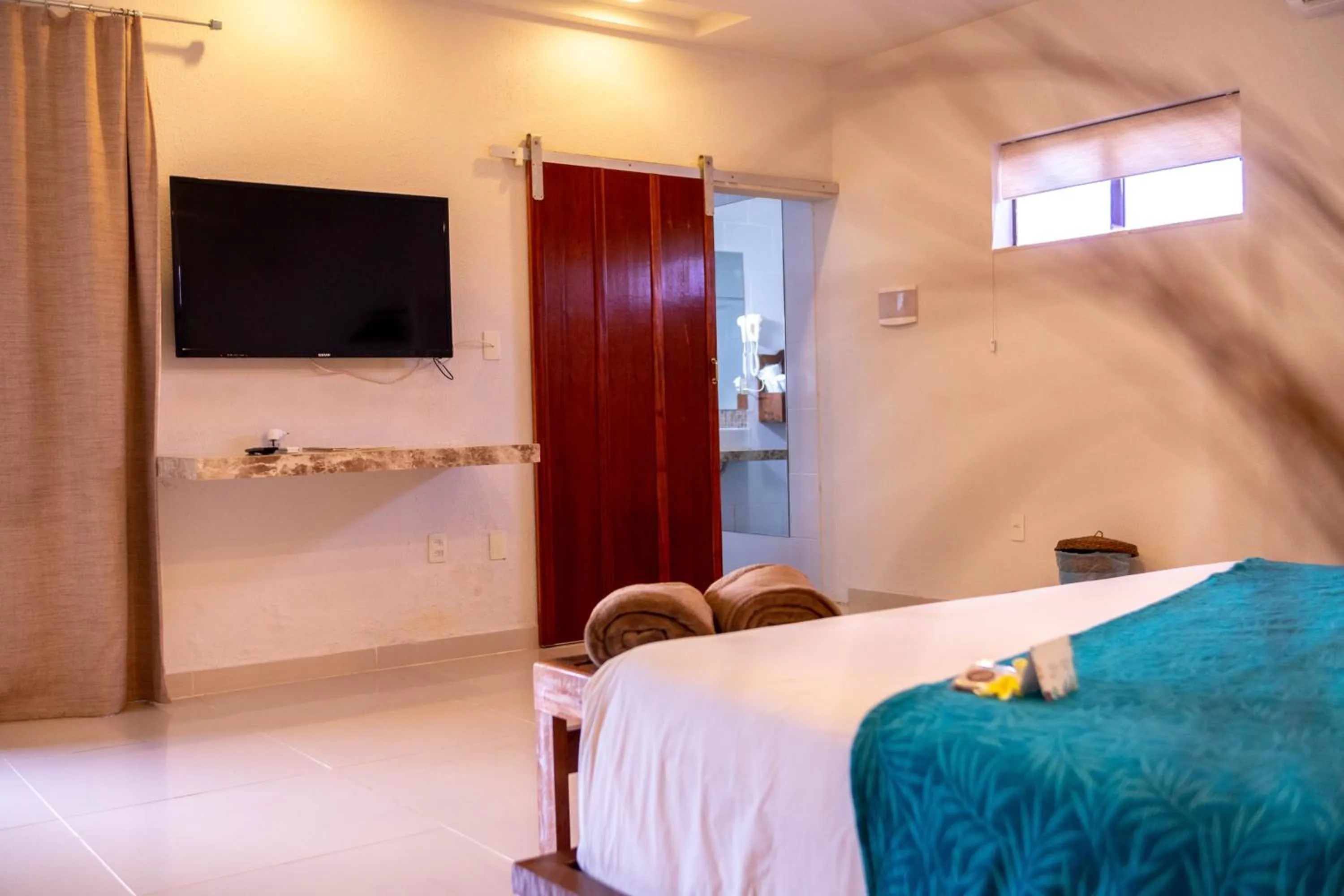 Bed in Oasis Tajaja Pousada Boutique na Costa do Conde