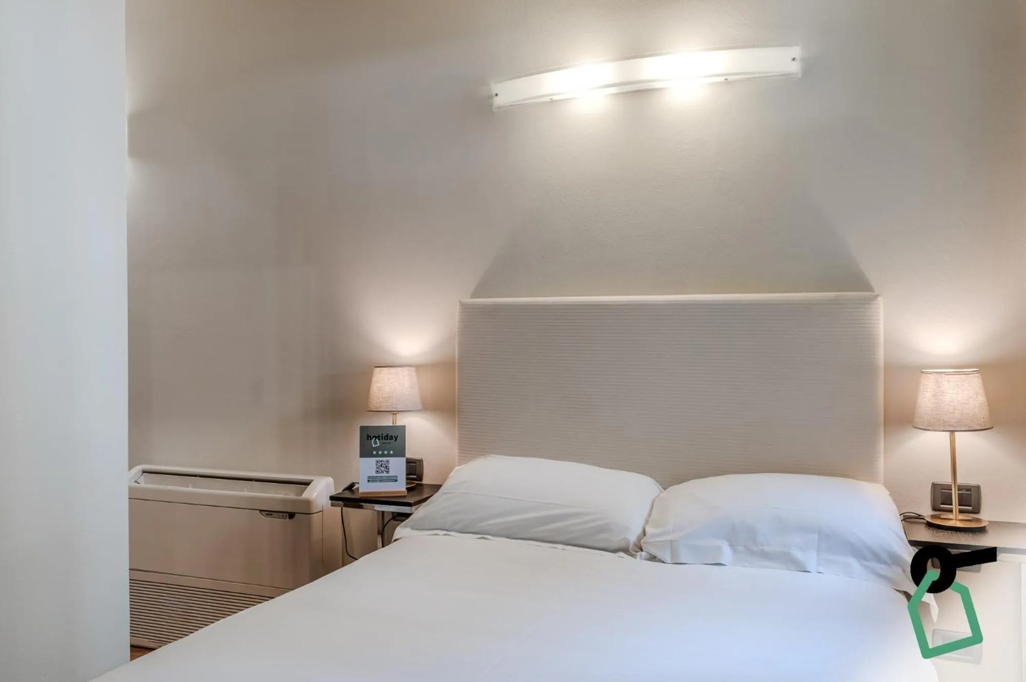 Bedroom in HOTIDAY ApartHotel Firenze