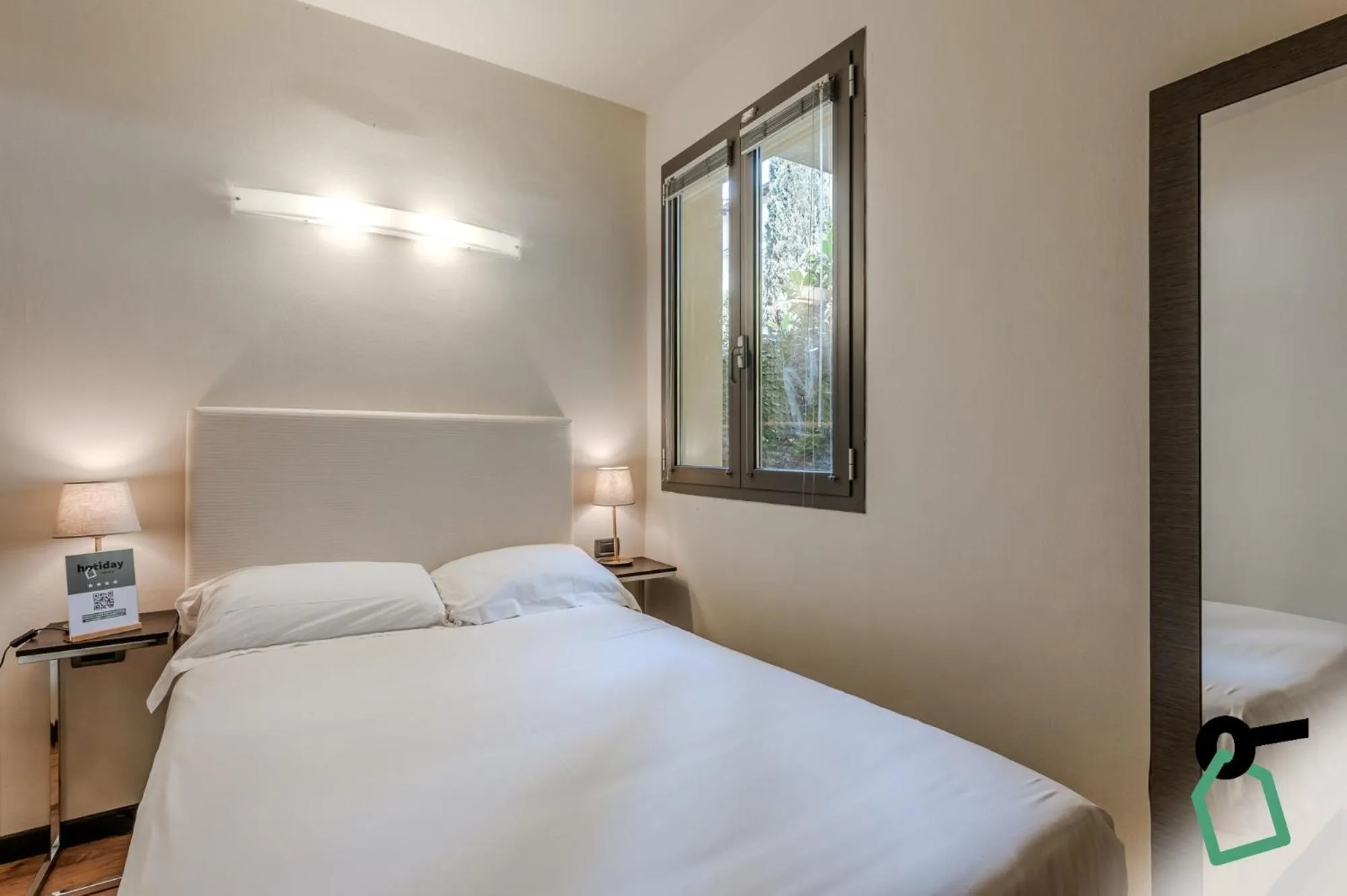 Bedroom in HOTIDAY ApartHotel Firenze