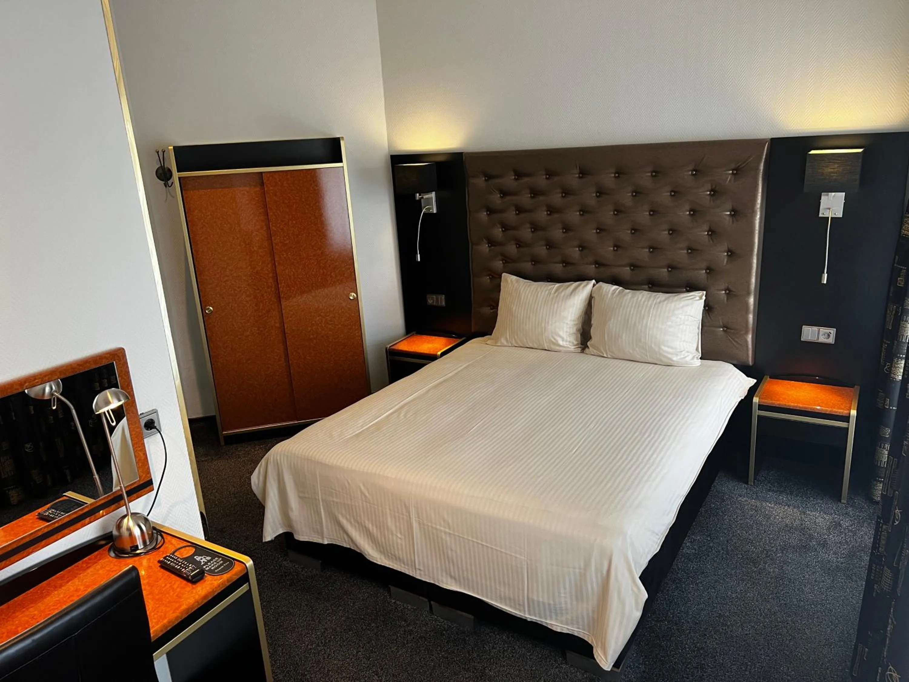 Bed in Hotel Le Beau Rivage