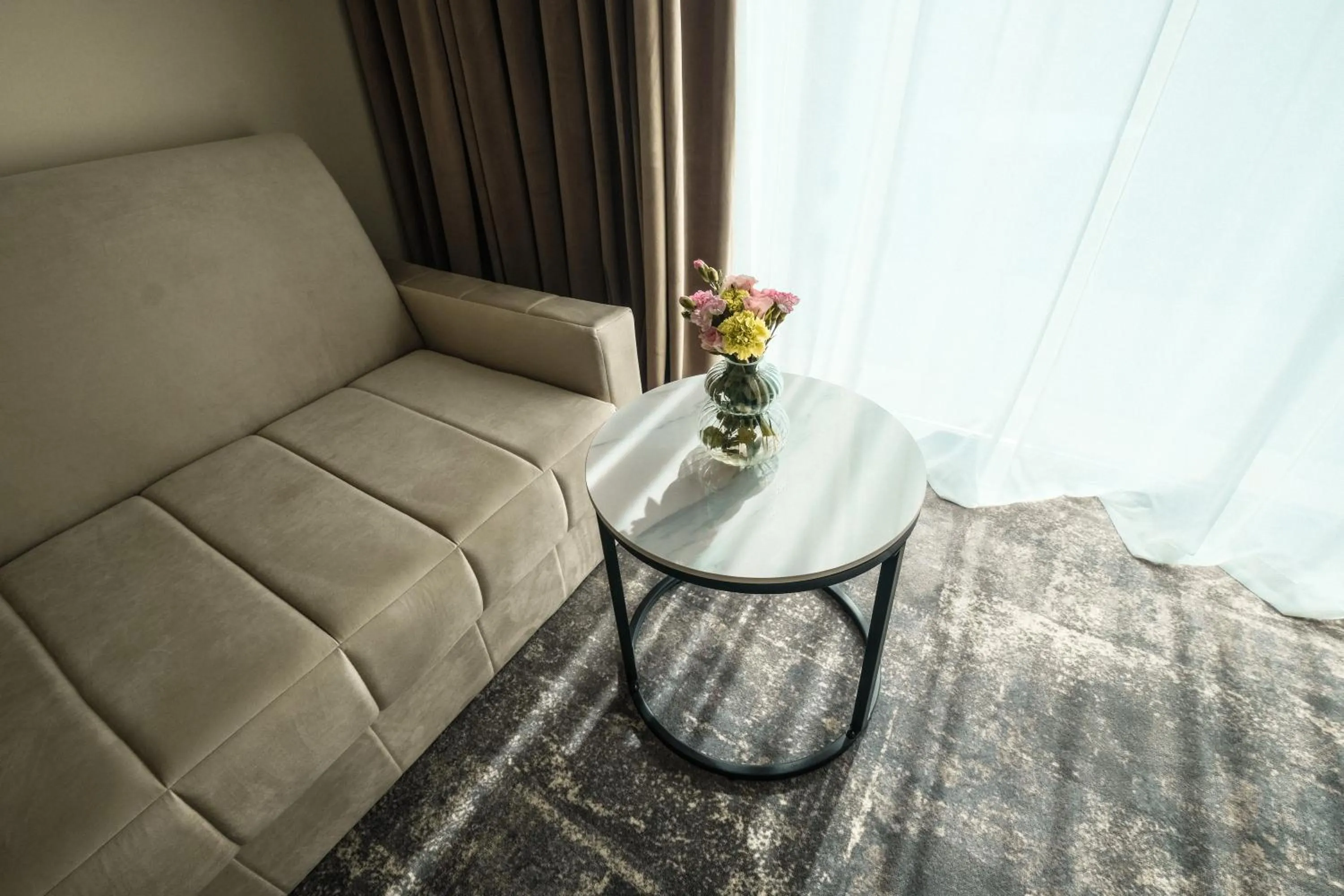 Seating area in Panoramic Mamaia Hotel