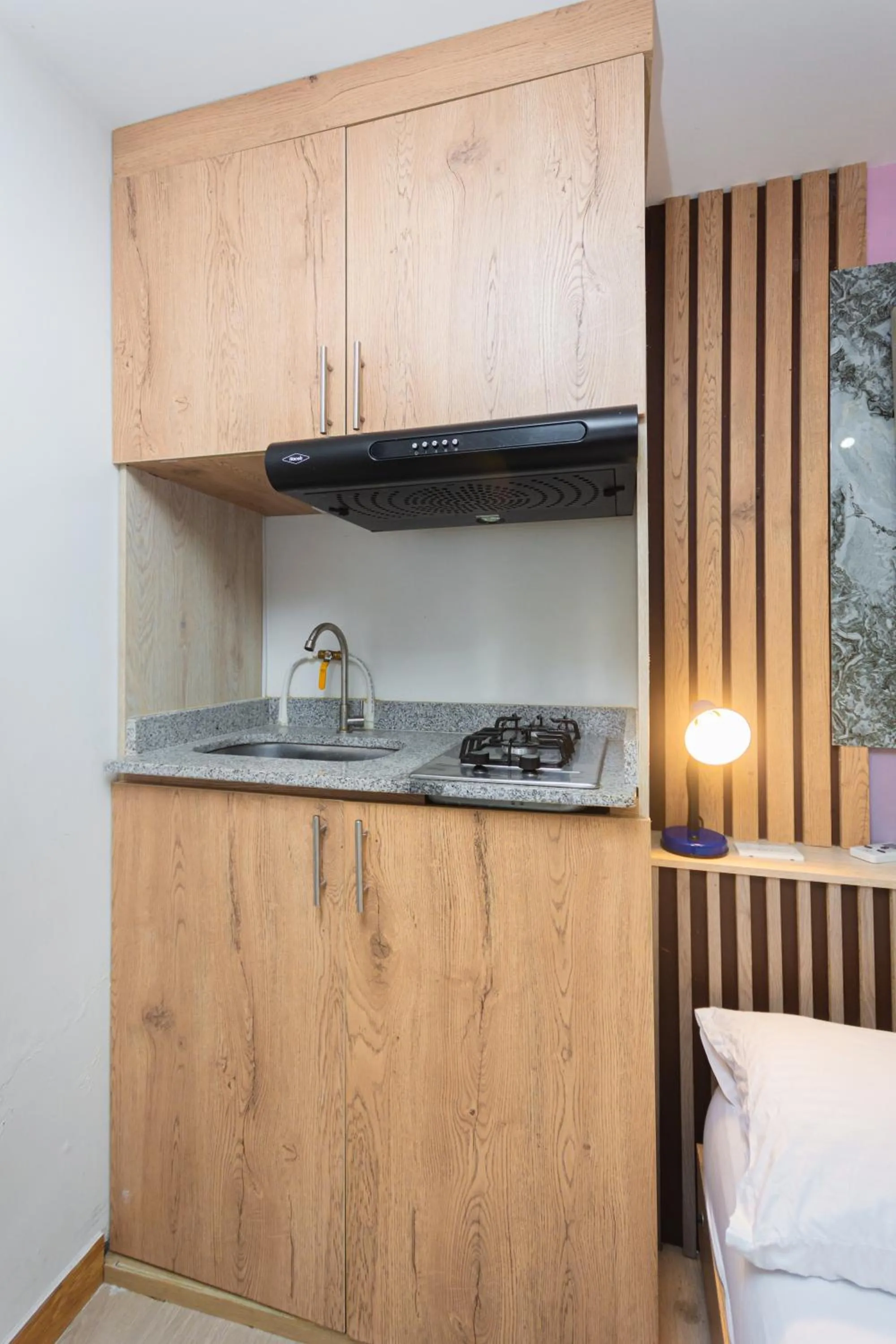 Kitchen or kitchenette, Bed in Hotel Lares 70 Laureles