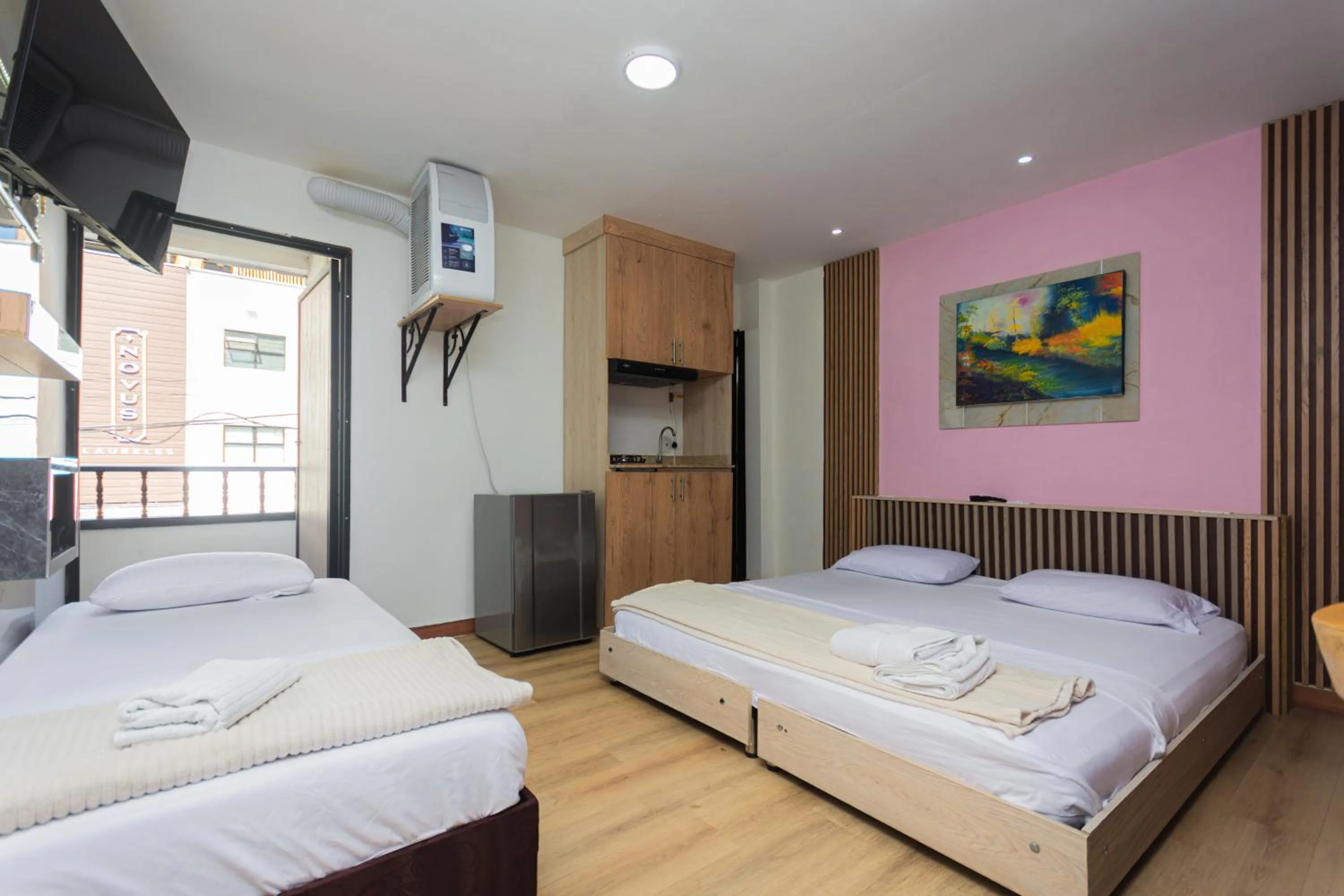 Photo of the whole room, Bed in Hotel Lares 70 Laureles